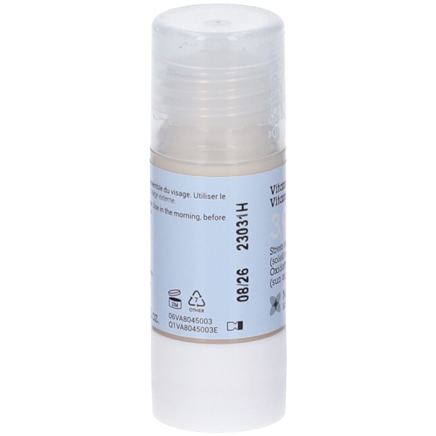 Flacone cilindrico con etichetta blu. Scritta: Vitamina E 3,9%. Logo NAOS Ecobiology. Tappo trasparente.