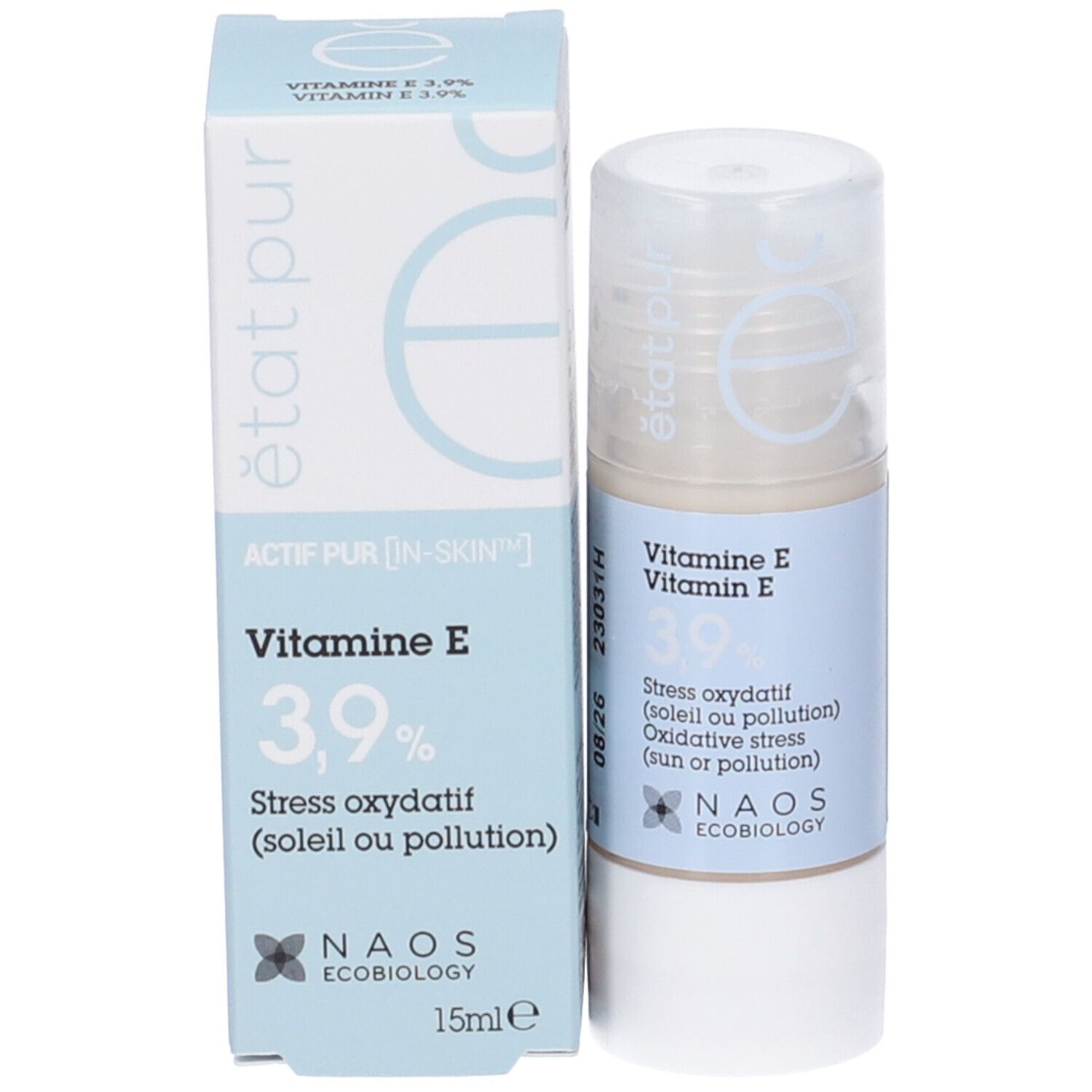 Confezione del prodotto con flacone. Scritta: Vitamina E 3,9%. Logo NAOS Ecobiology. 15ml. Colori blu e bianco.