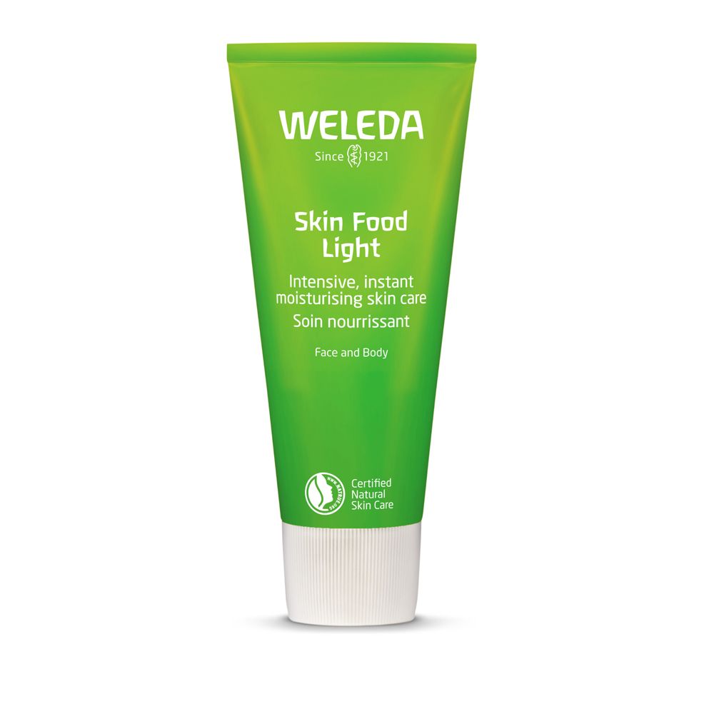 Tubo verde con tappo bianco. Scritta: WELEDA, Skin Food Light. Sigillo cosmetici naturali certificati.