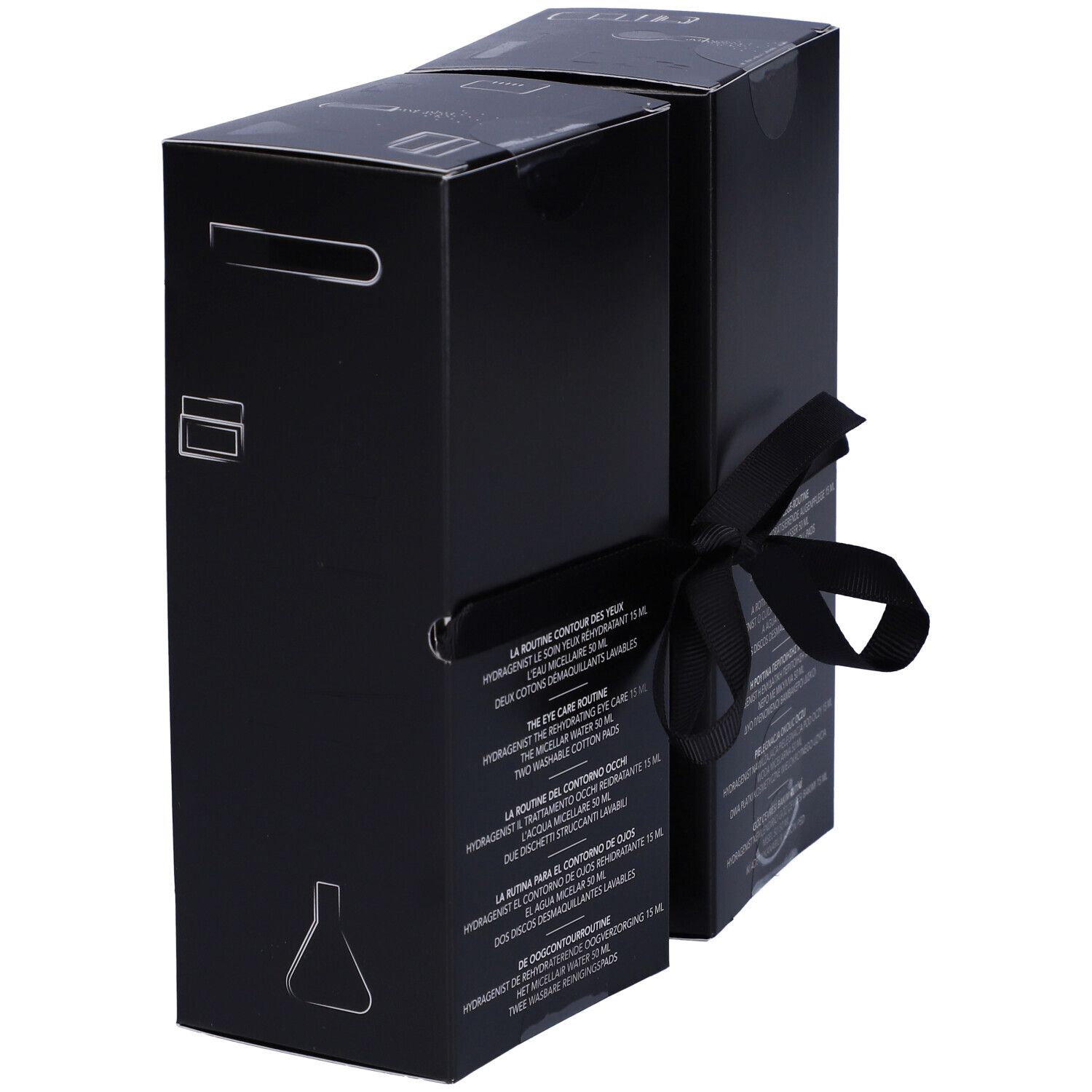 Cofanetto nero con nastro. Testo multilingue. Logo Lierac. Manico in alto.