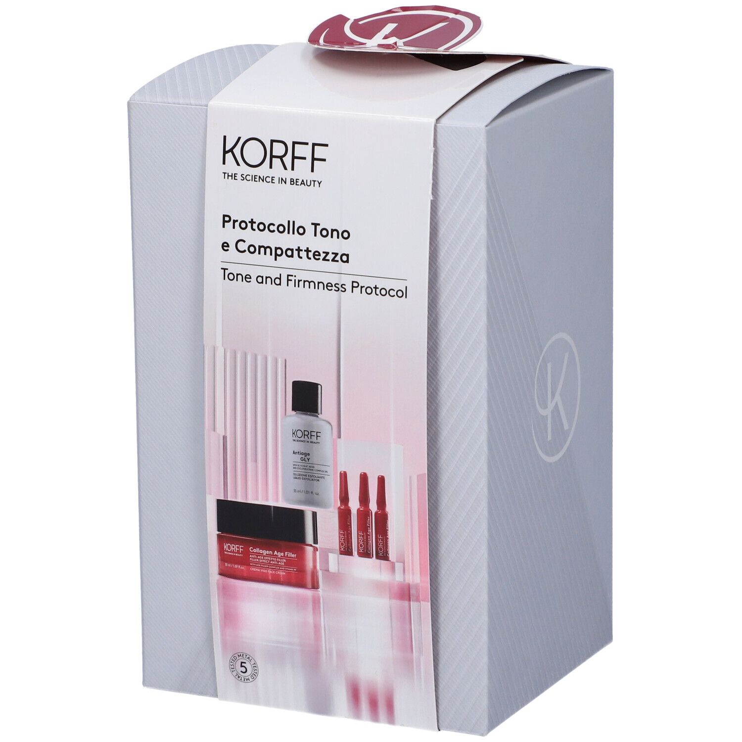 Confezione regalo KORFF. Logo e nome del prodotto visibili. Contiene flaconi e fiale. Confezione grigia con dettagli rossi.