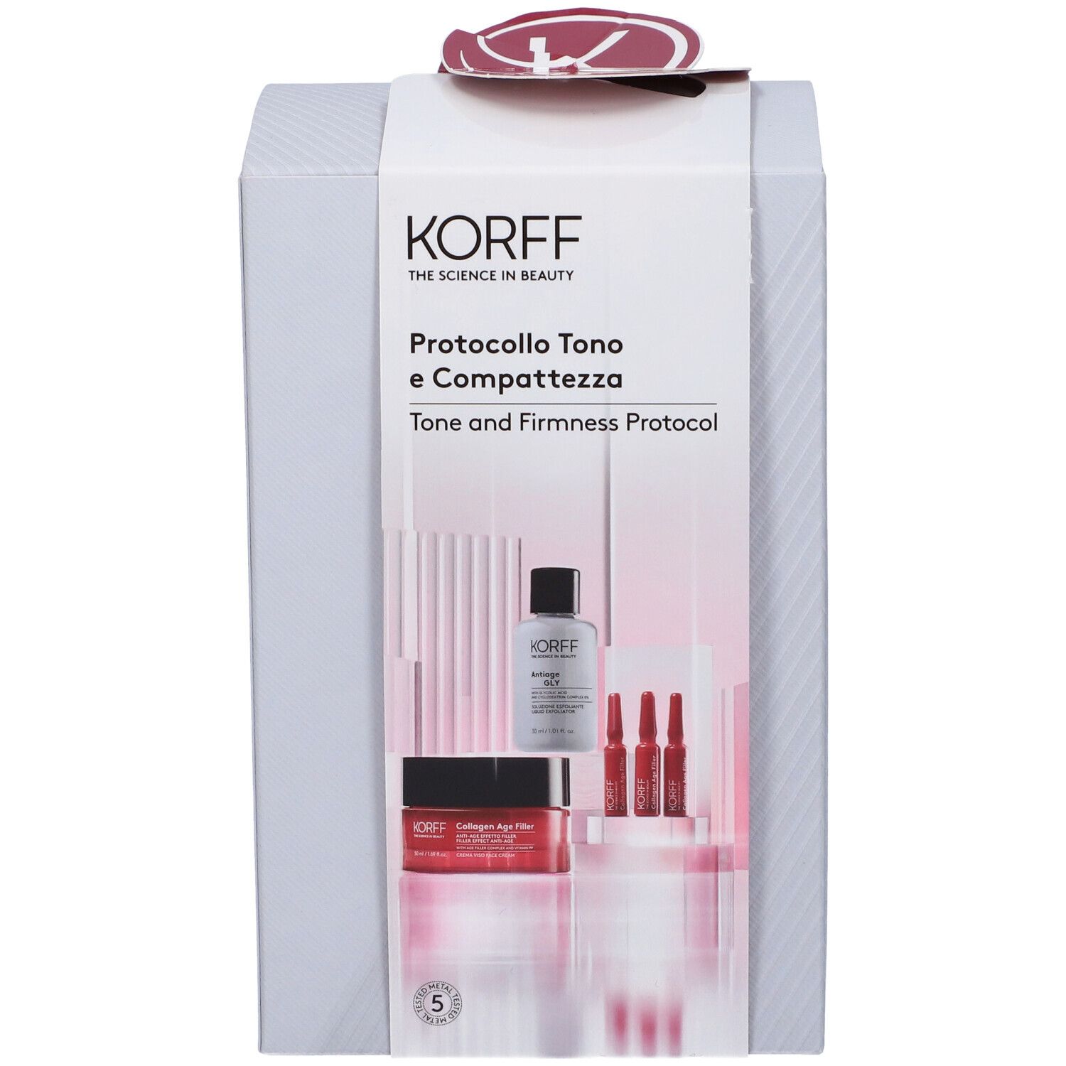 Confezione regalo KORFF. Logo e nomi dei prodotti visibili. Contiene flaconi e fiale. Confezione grigia con dettagli rossi.