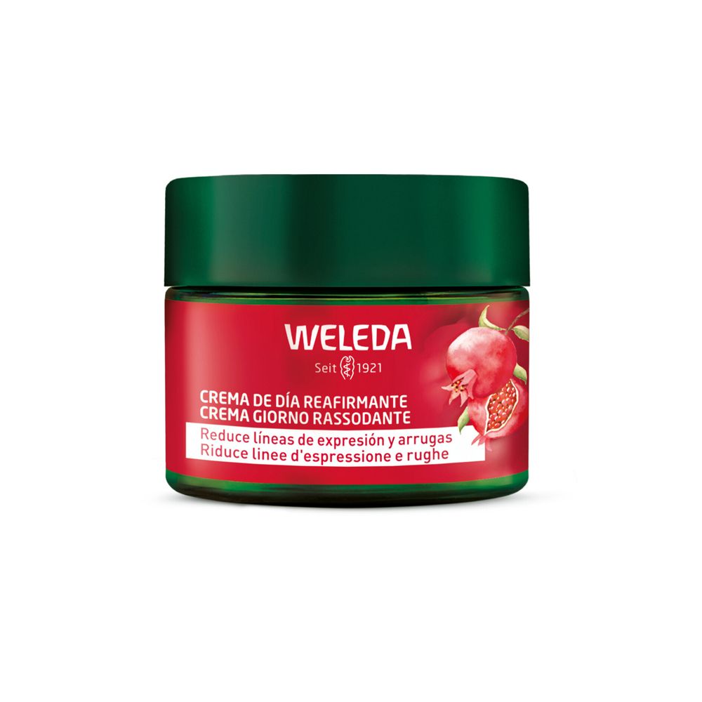 Vasetto verde con etichetta rossa. Scritta: WELEDA, Crema Giorno Rassodante. Illustrazione melograno.