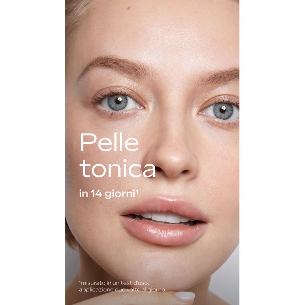Ritratto di donna. Testo: Pelle tonica in 14 giorni. Misurazione in un test d'uso, due volte al giorno.