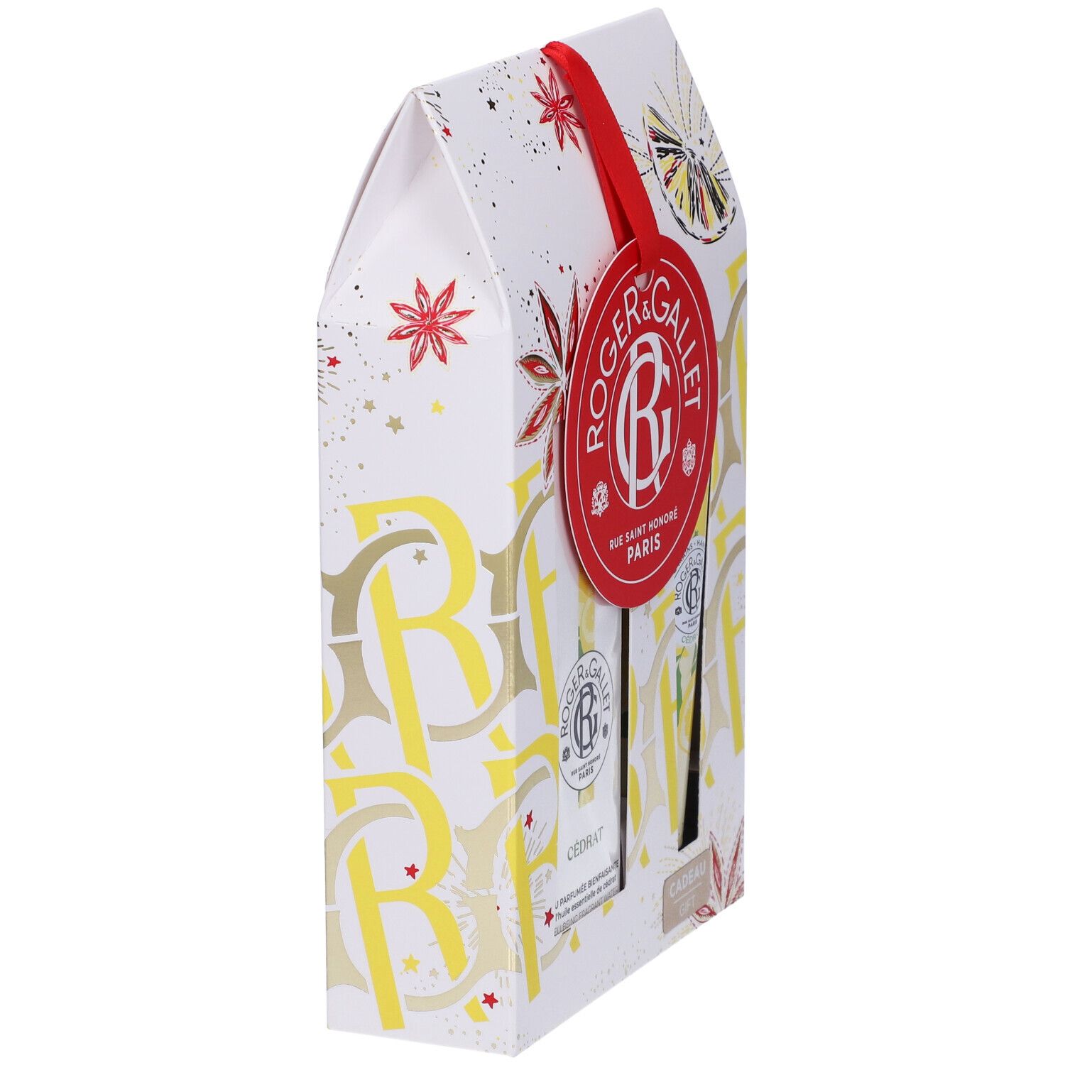 Cofanetto regalo, vista laterale. Etichetta rossa con logo. Confezione con motivi di limoni gialli e dettagli rossi.