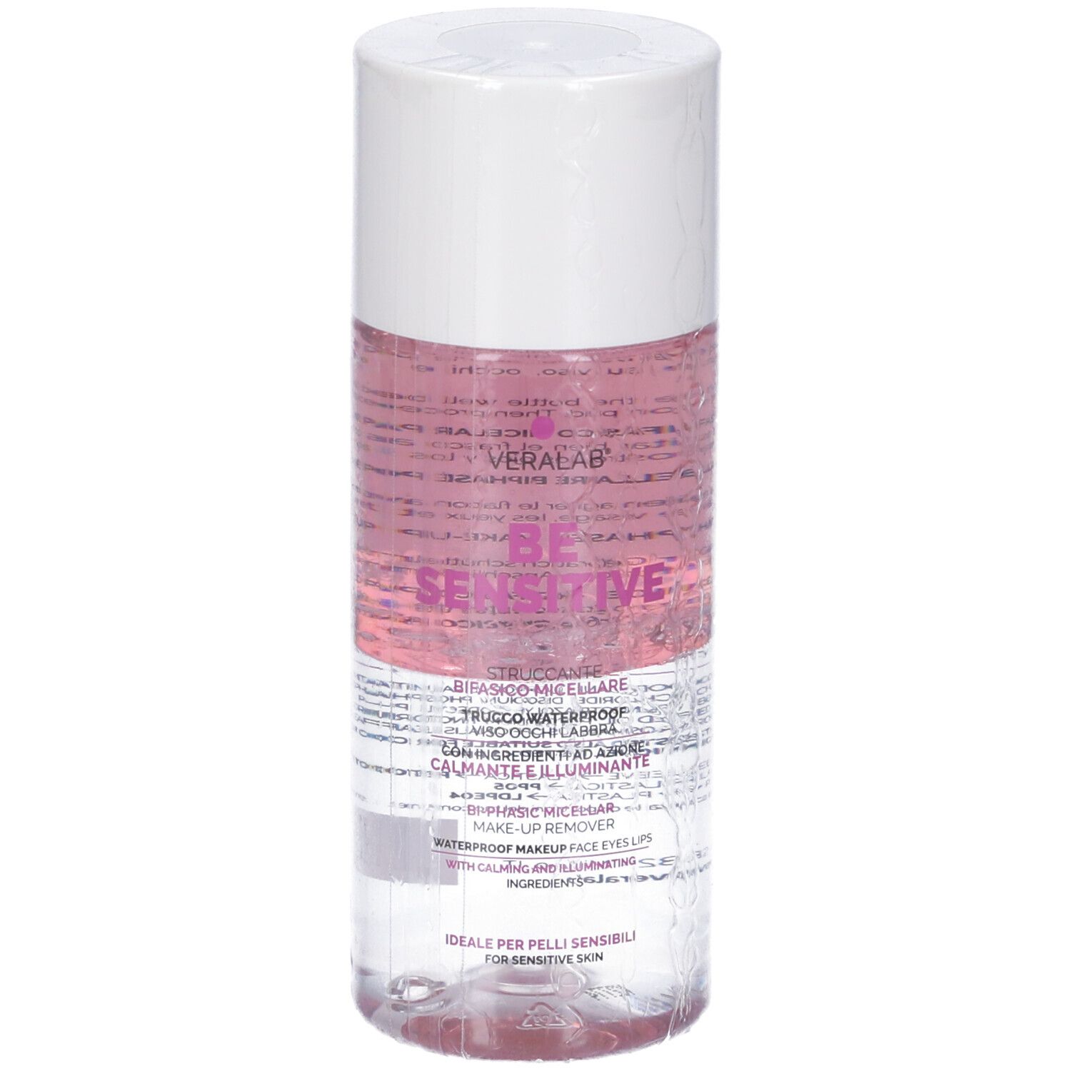 Flacone cilindrico con liquido rosa e tappo bianco. Scritta: BE SENSITIVE. Etichetta con testo.