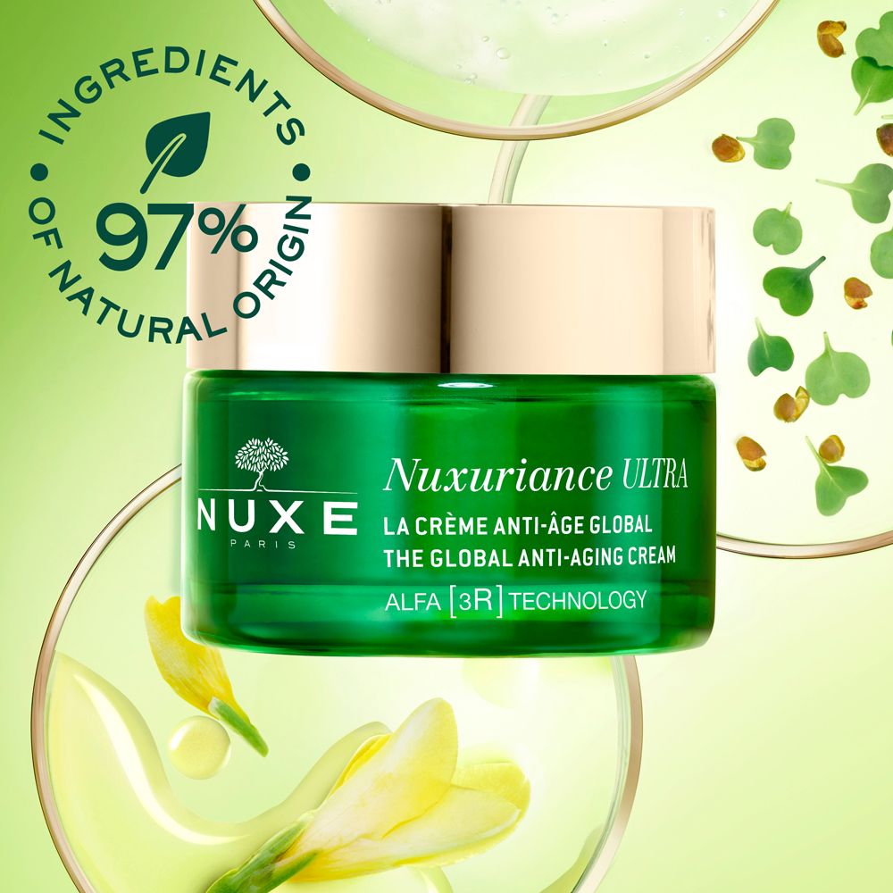 Vasetto verde con crema. Scritta: Nuxuriance Ultra, La Crème Anti-Âge Global. Logo albero. Coperchio dorato. 97% ingredienti naturali.