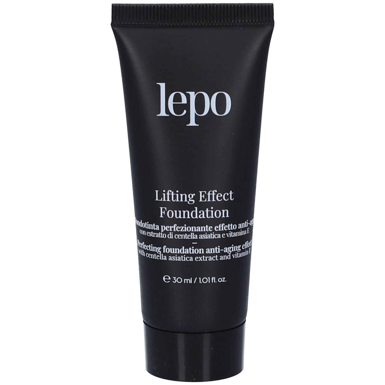 Retro della confezione. Ingredienti, logo vegano, istruzioni per il riciclaggio. Sfondo beige.