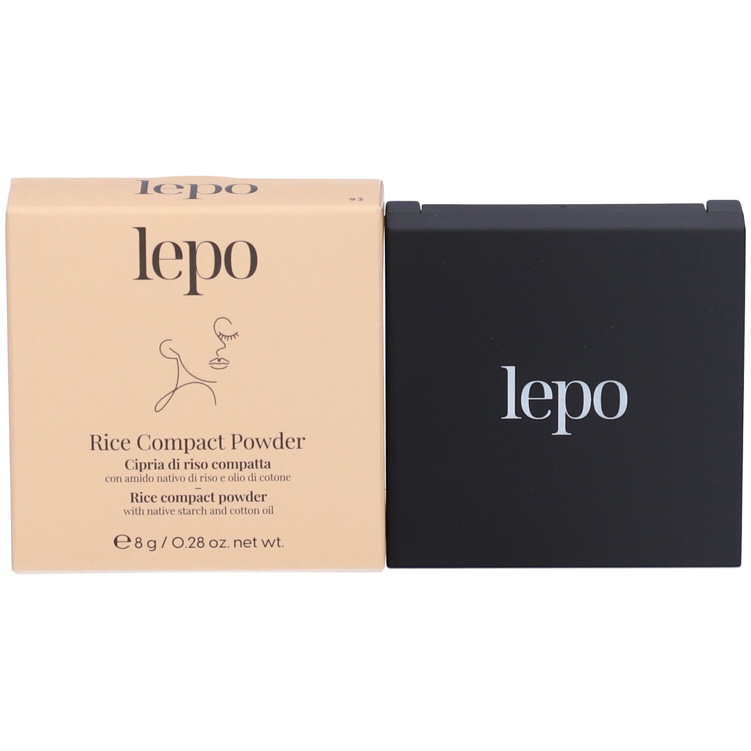 Astuccio per cipria compatta e scatola affiancati. Astuccio nero con logo bianco. Scatola beige con logo e informazioni.