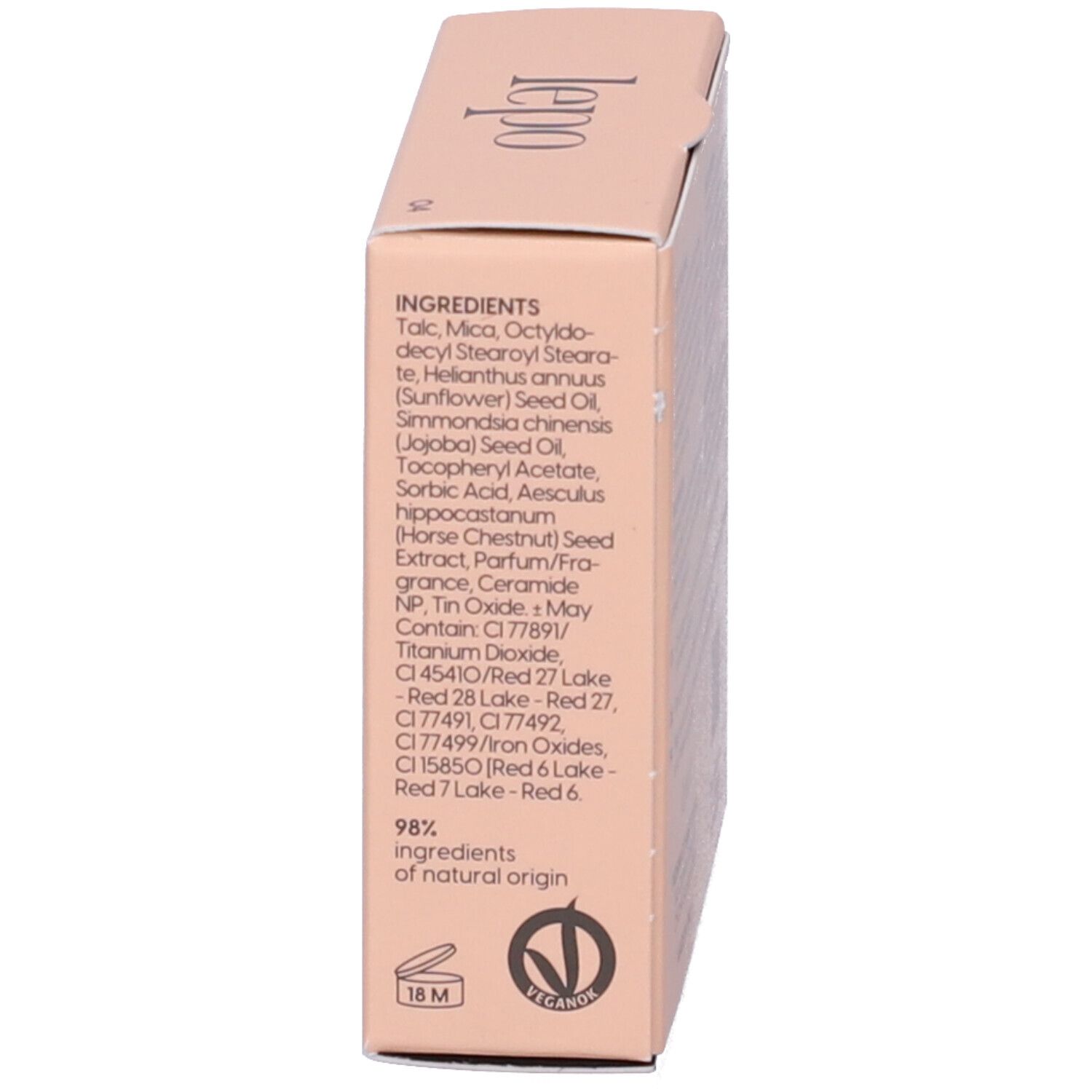 Lato della confezione del fard compatto. Elenco degli ingredienti e logo vegano.