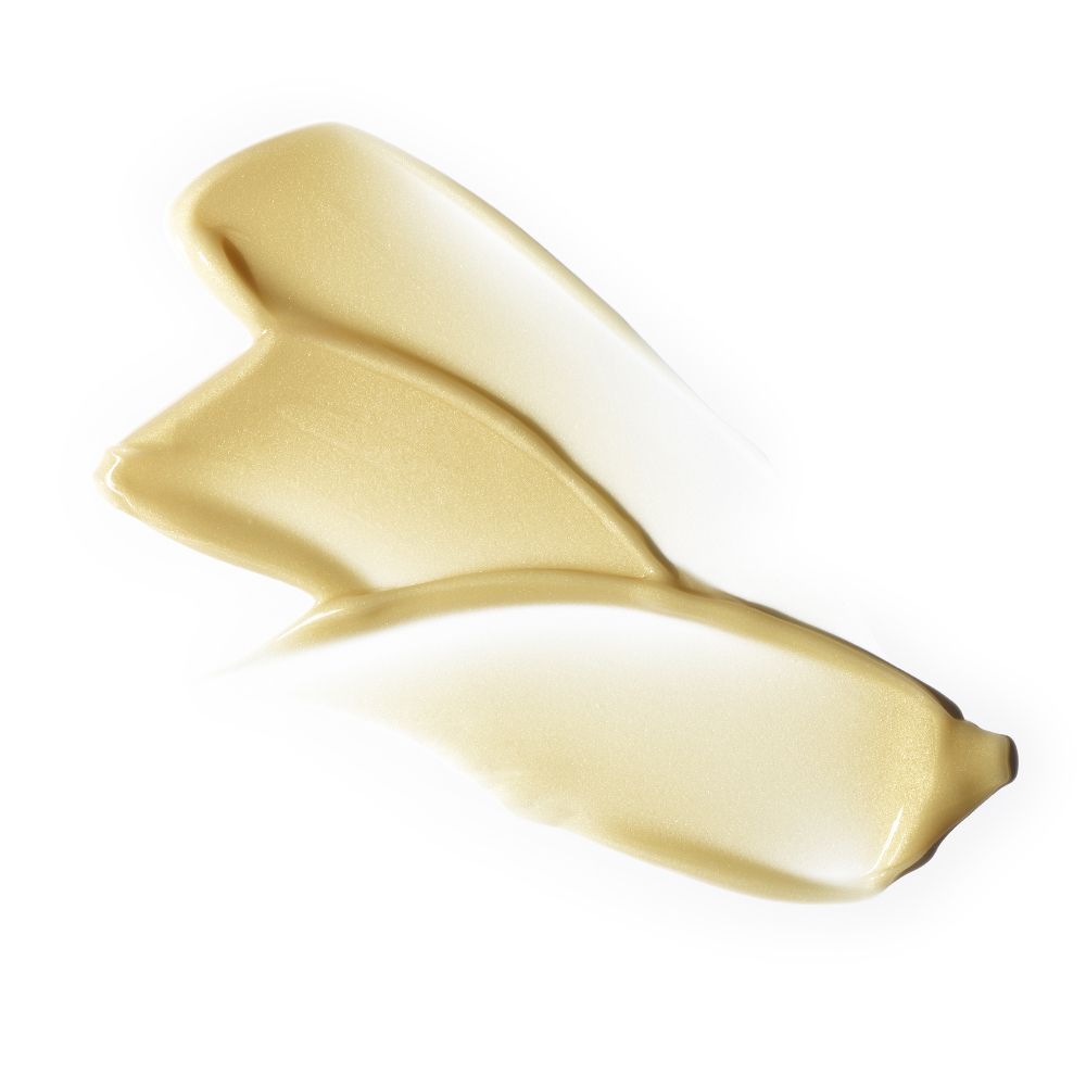 Tre strisce di prodotto color crema su sfondo bianco. La consistenza è lucida.