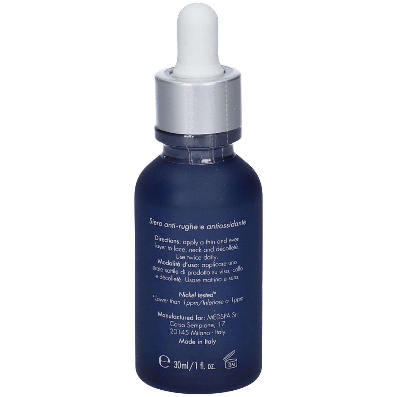 Flacone di siero blu scuro con tappo argento e pipetta. Testo sul retro in italiano.