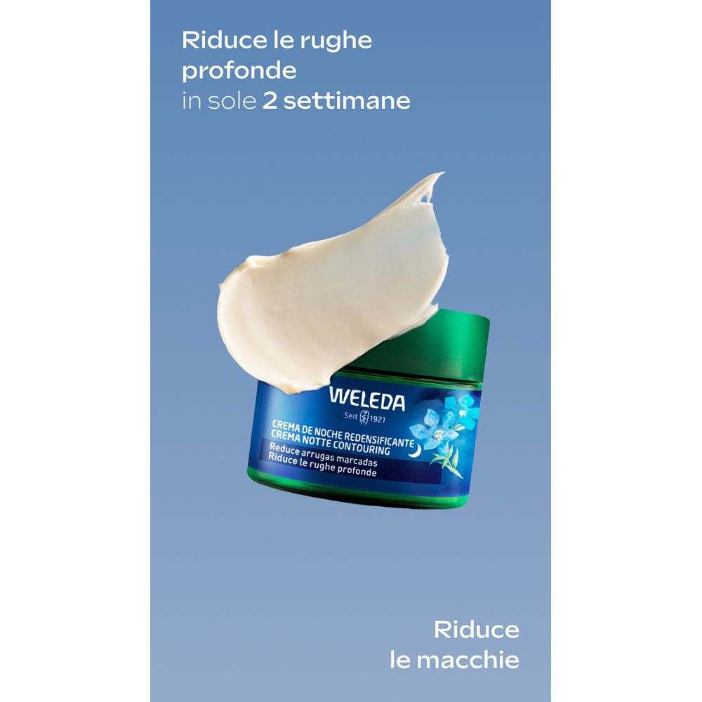 Prodotto e macchia di crema. Scritta: WELEDA, Crema Notte Contouring. Riduce le rughe. Sfondo blu.