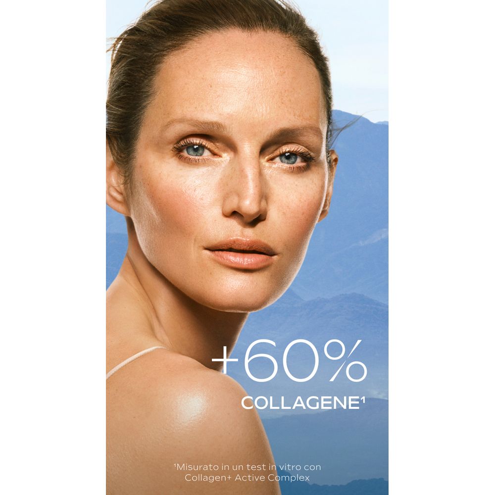 Ritratto di donna. Scritta: +60% COLLAGENE. Sfondo: cielo blu e montagne.