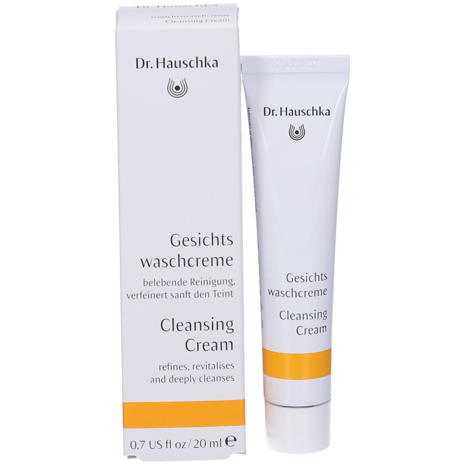 Prodotto e confezione. Tubo e scatola bianchi. Scritta: Dr. Hauschka, Gesichts-waschcreme, Cleansing Cream. Striscia gialla.