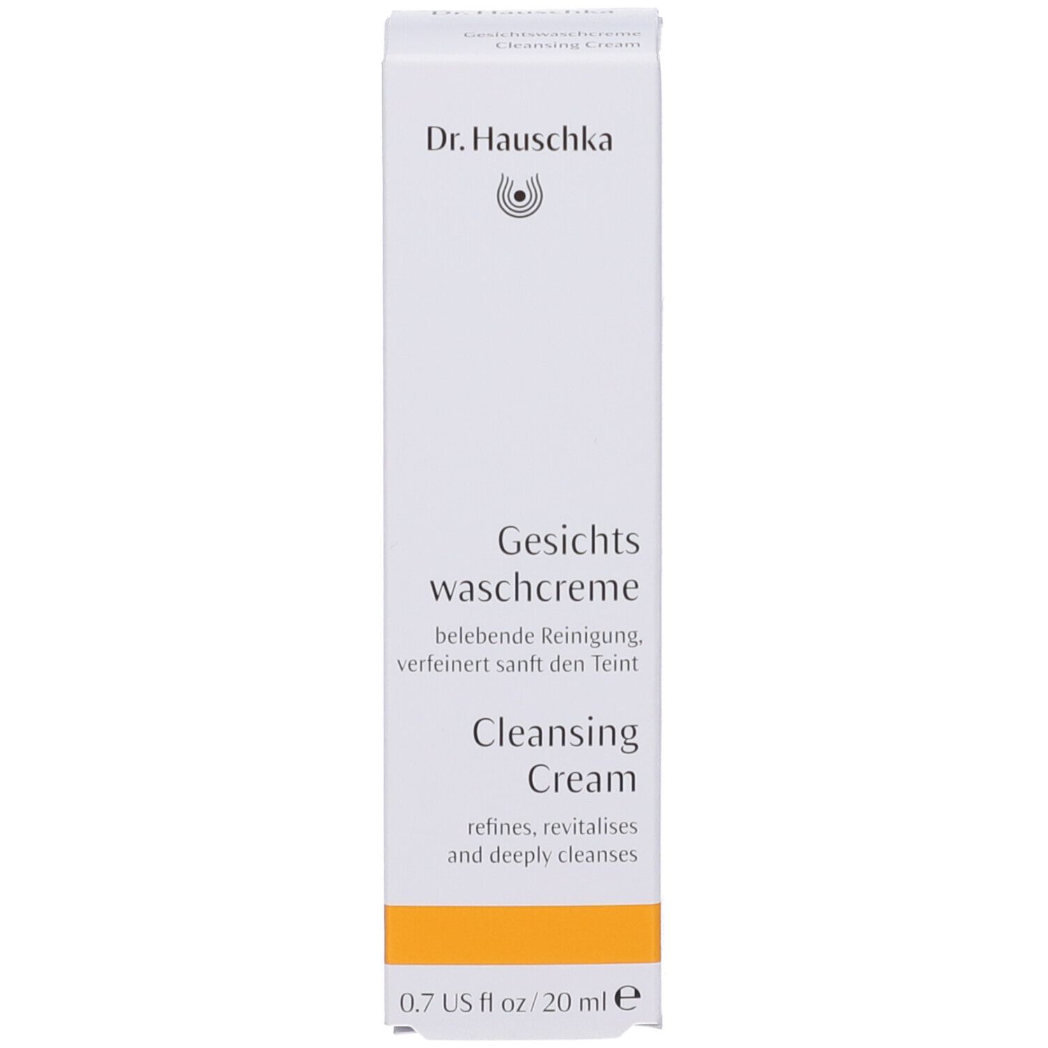Scatola bianca con scritta: Dr. Hauschka, Gesichts-waschcreme, Cleansing Cream. Striscia gialla. Scritta: 0.7 US fl oz / 20 ml.