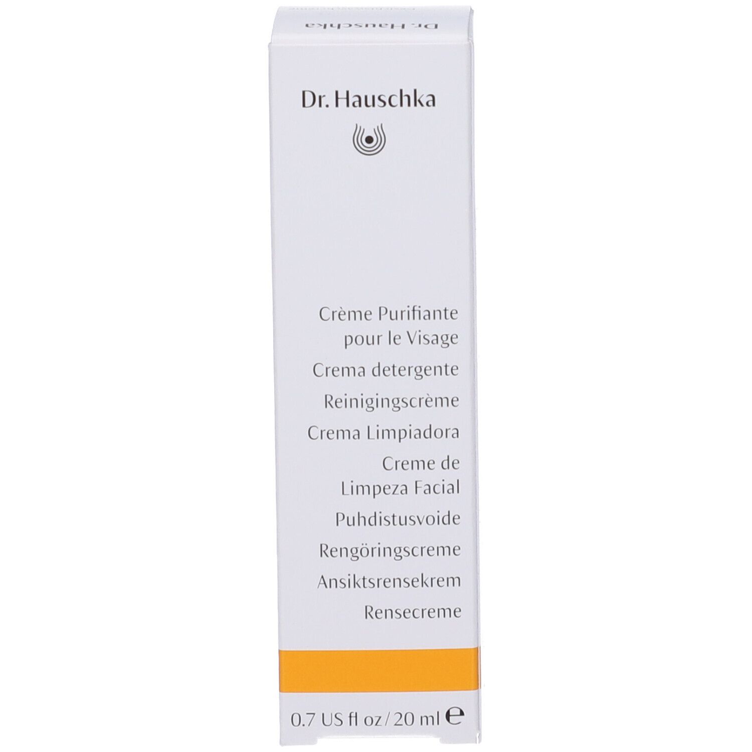 Lato della scatola. Testo multilingue: Crème Purifiante, Crema detergente, Reinigingscrème, etc. Striscia gialla. Scritta: 0.7 US fl oz / 20 ml.