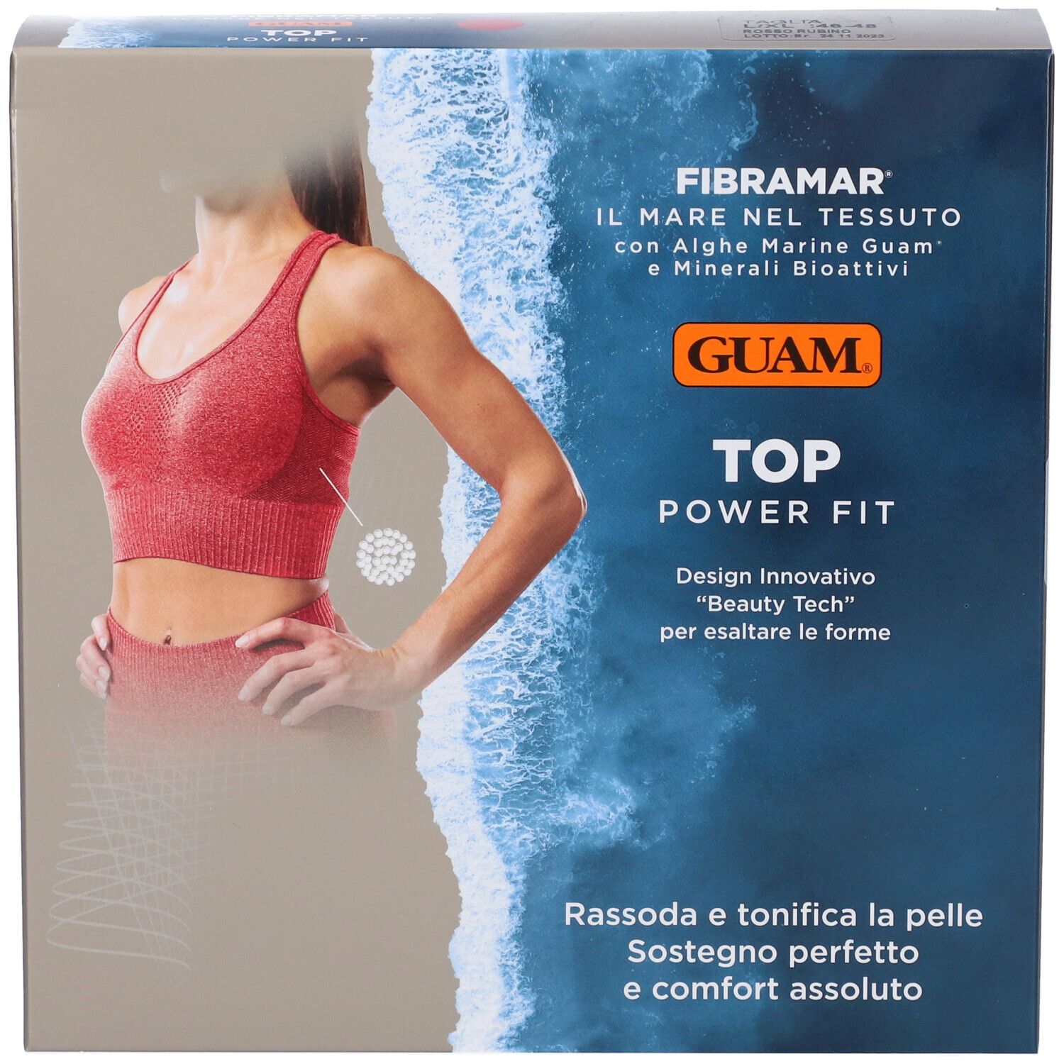 Confezione. Scritta: Guam Top Power Fit, Rosso Rubino. Immagine di donna in abbigliamento sportivo.
