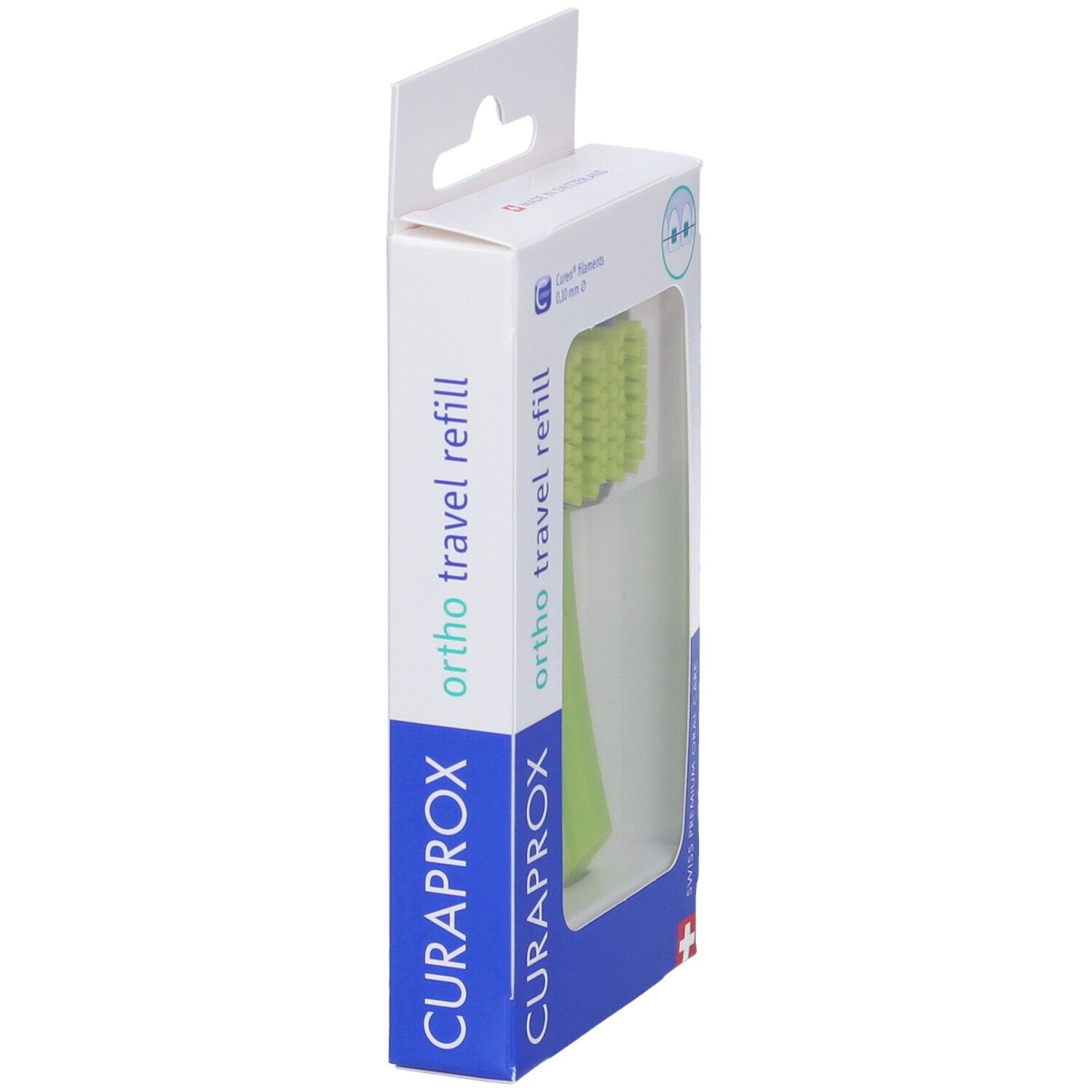 Una testina verde in confezione bianca con finestra. Marca: Curaprox, Ortho Travel Refill.