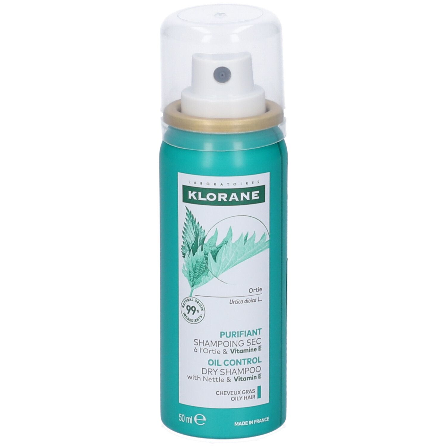 Klorane shampoo secco all'ortica e vitamina E. Flacone spray turchese con tappo bianco. Nome del prodotto e logo visibili.