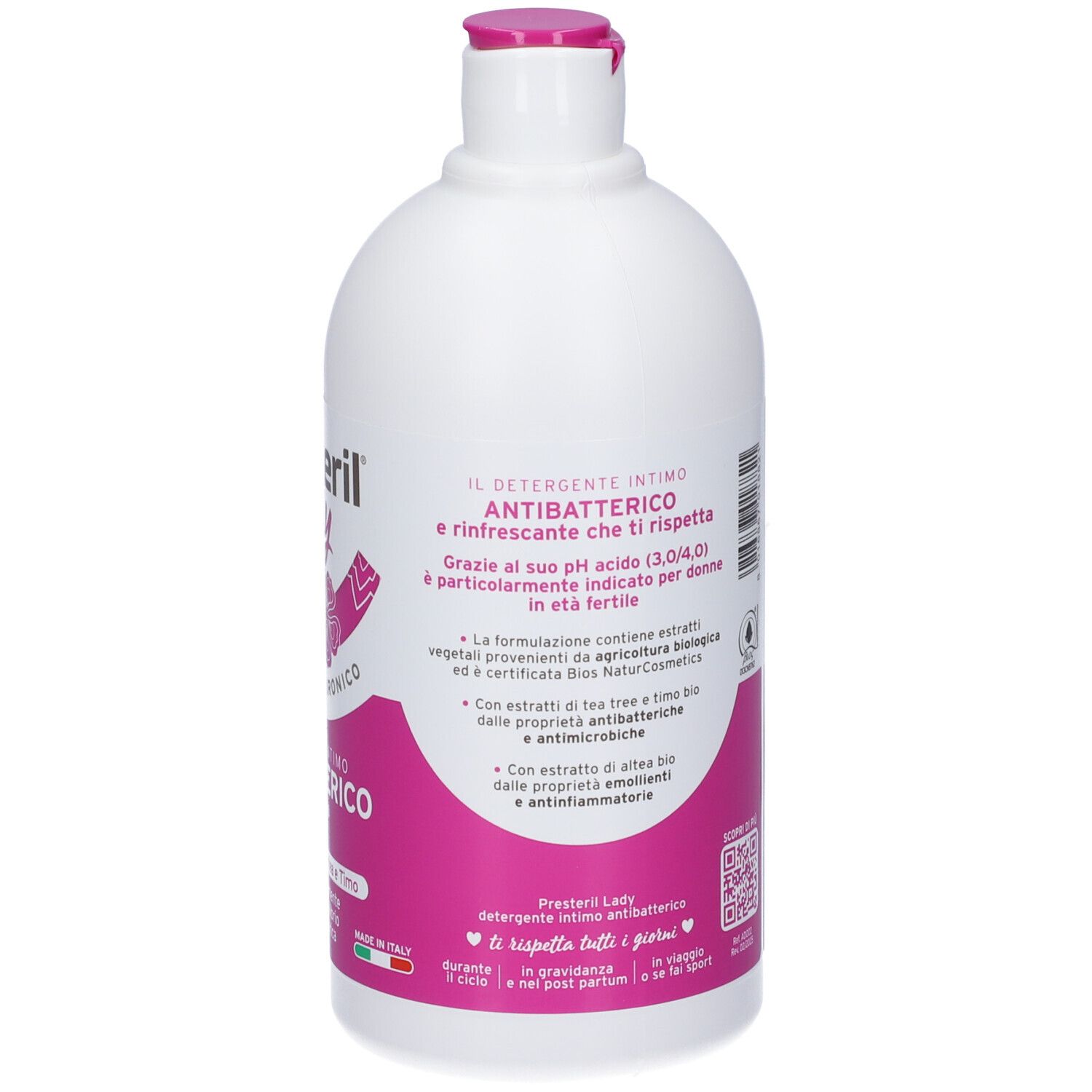 Retro di un flacone bianco con etichetta rosa. Contiene informazioni sul prodotto.