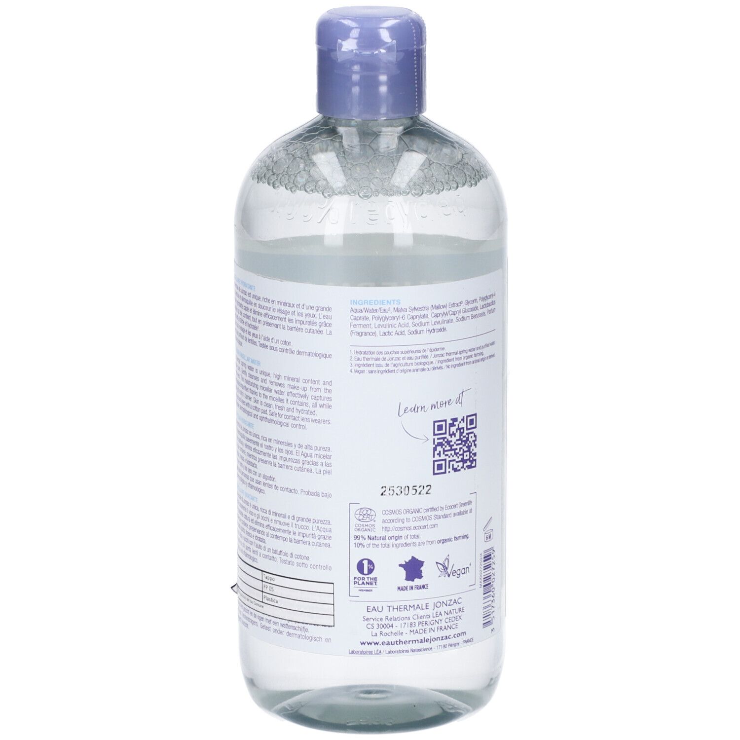 Vista posteriore del flacone con testo, codice QR e sigilli. Flacone con tappo viola e contenuto trasparente.