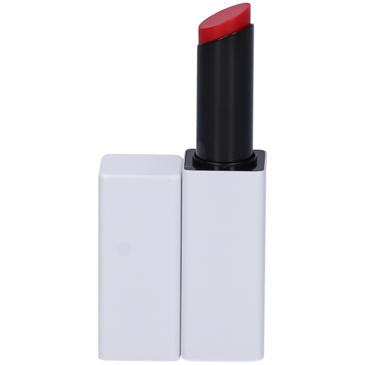 Rossetto rosso in astuccio bianco. Manicotto nero. Tappo accanto.