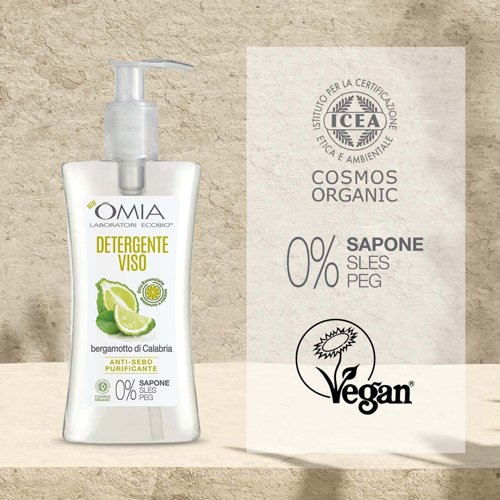 Detergente viso con estratto di bergamotto. Logo, certificazioni: Cosmos Organic, Vegan. 0% SLES PEG.