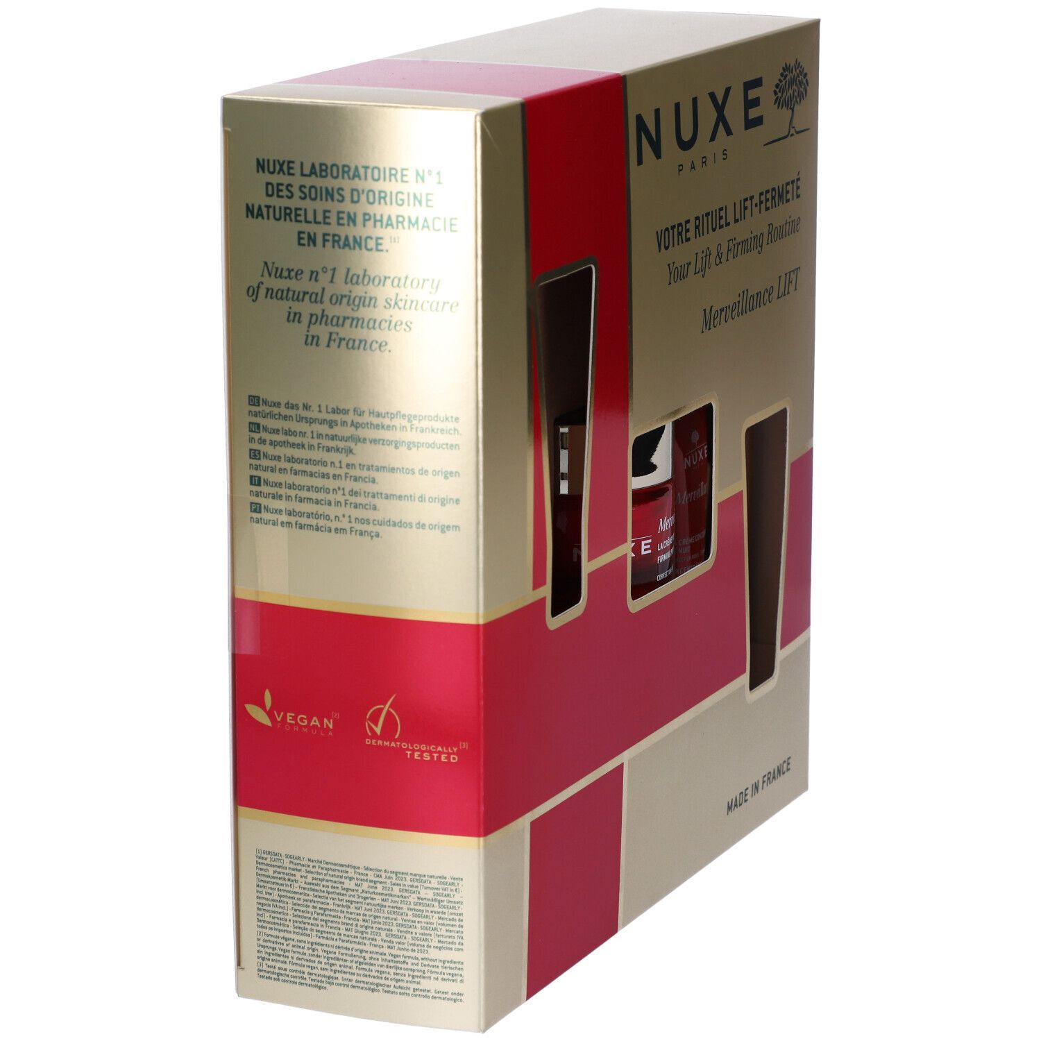Confezione Nuxe. Dorata con striscia rossa. Testo: Nuxe, Votre Rituel Lift-Fermeté, logo Vegan.