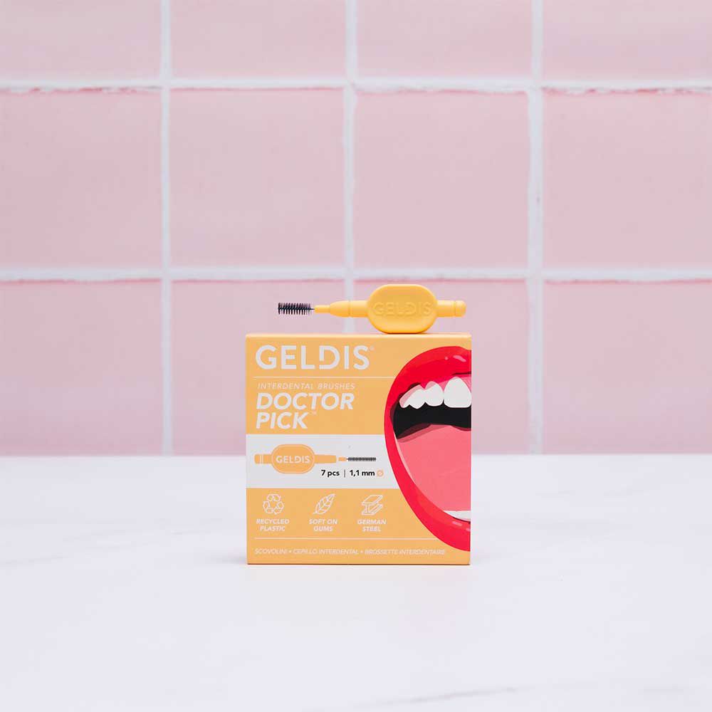Geldis Doctor Pick e confezione. Scatola gialla con prodotto e illustrazione bocca.