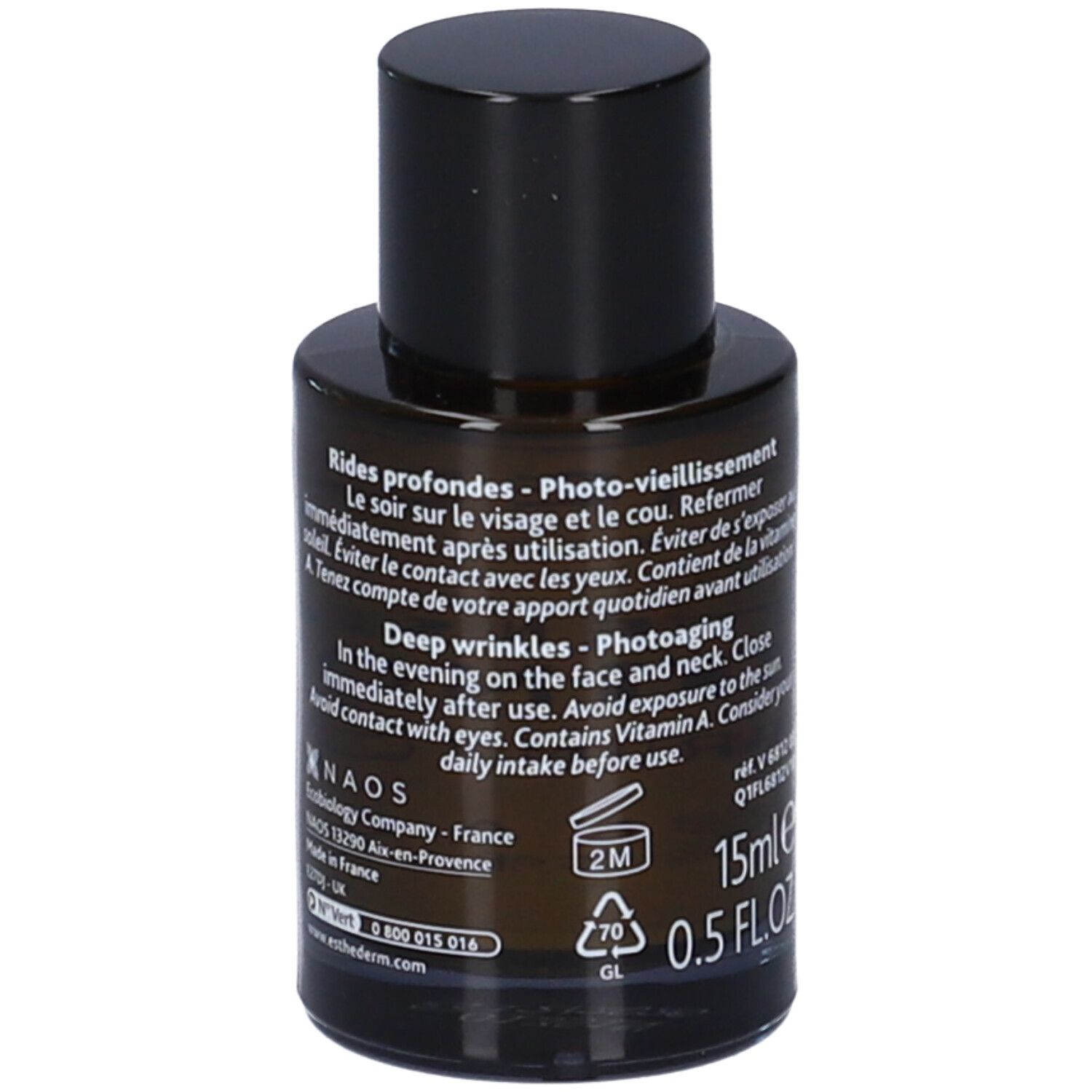 Flacone di vetro marrone con tappo nero. Testo sul retro. 15ml, 0.5 FL.OZ. NAOS Ecobiology.