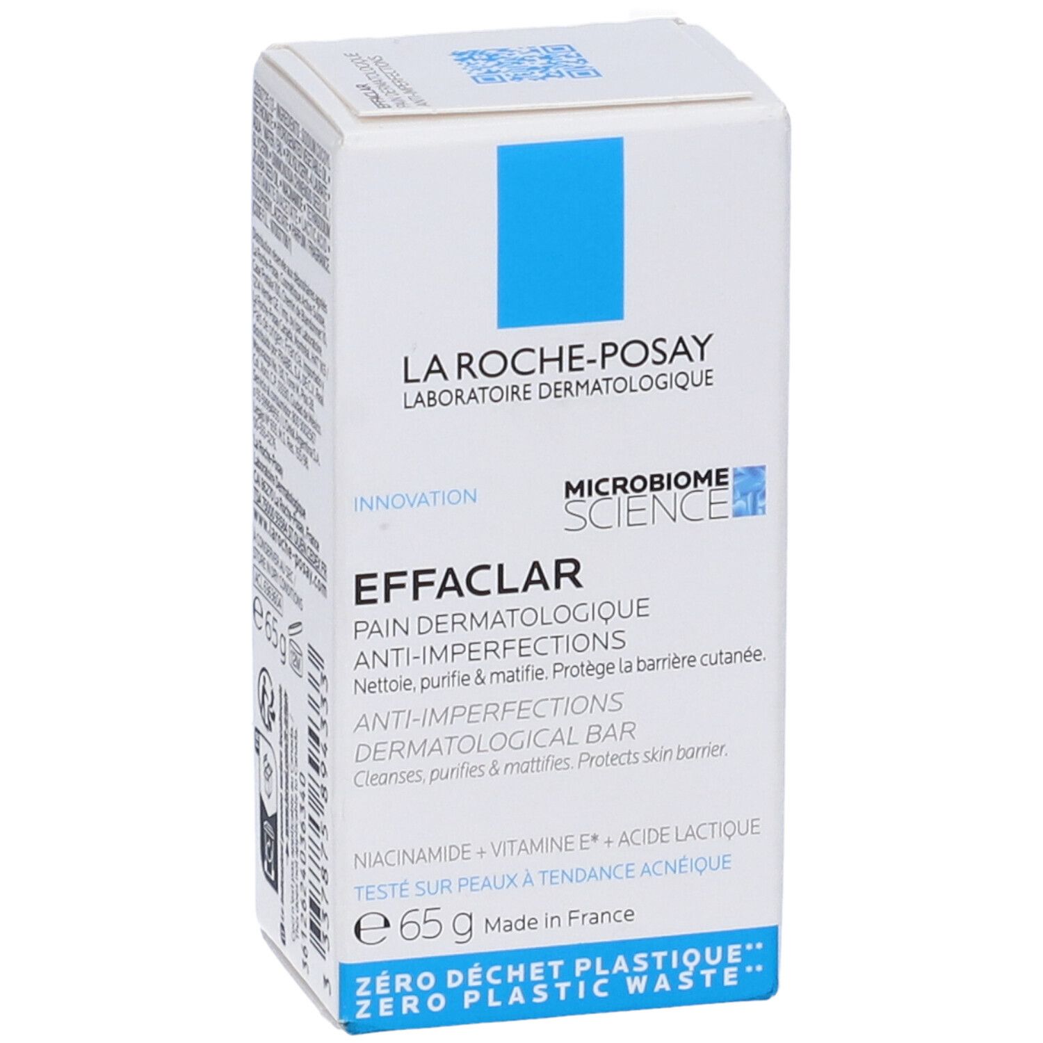 Scatola bianca con quadrato blu. Scritto: La Roche-Posay, Effaclar, Anti-imperfezioni, bar dermatologico. 65g.