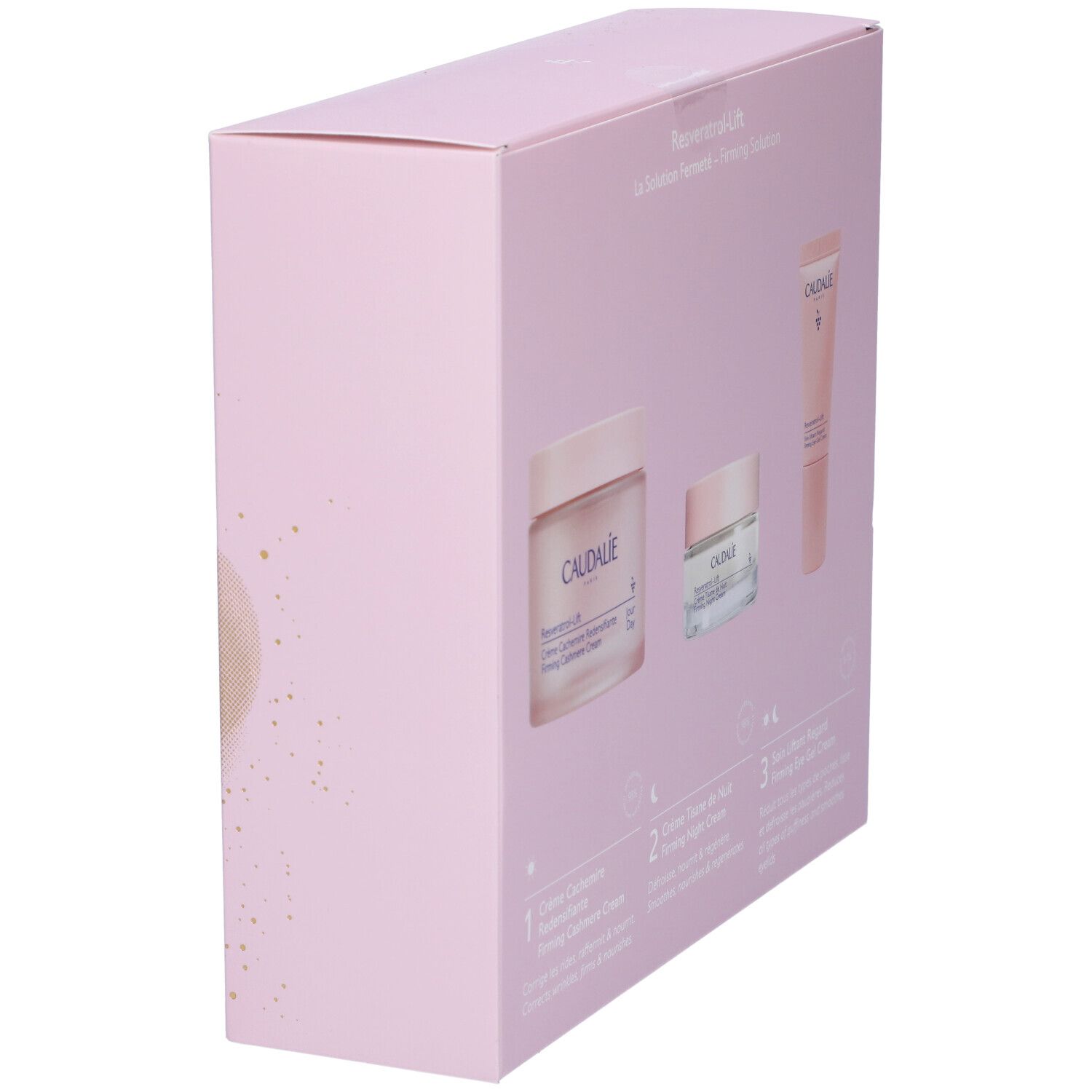 Vista laterale di confezione regalo rosa Caudalie con tre prodotti. Nomi prodotti e marchio Caudalie visibili.