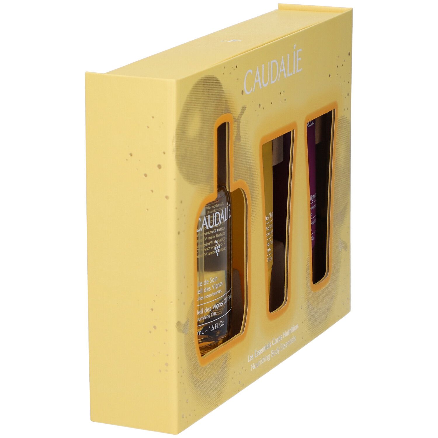 Confezione regalo gialla con tre prodotti. Logo Caudalie in alto. Vista laterale. Nomi dei prodotti parzialmente visibili.