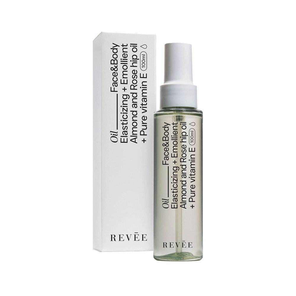 Flacone di olio trasparente con vaporizzatore bianco e scatola. Scritte: Revée, Face&Body Oil, olio di mandorle e rosa canina, vitamina E.