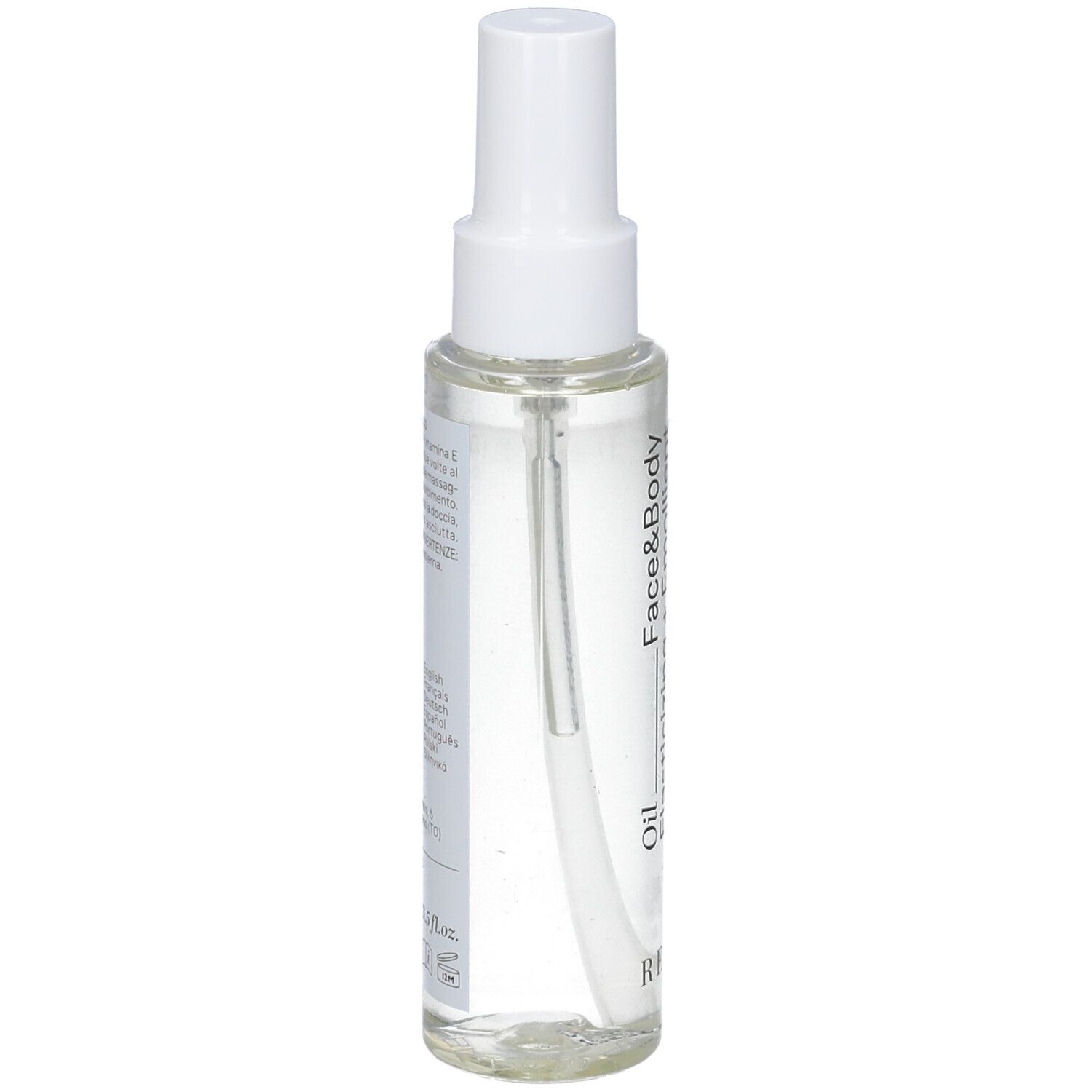 Flacone di olio trasparente con vaporizzatore bianco. Scritte: Revée, Face&Body Oil, olio di mandorle e rosa canina, vitamina E.