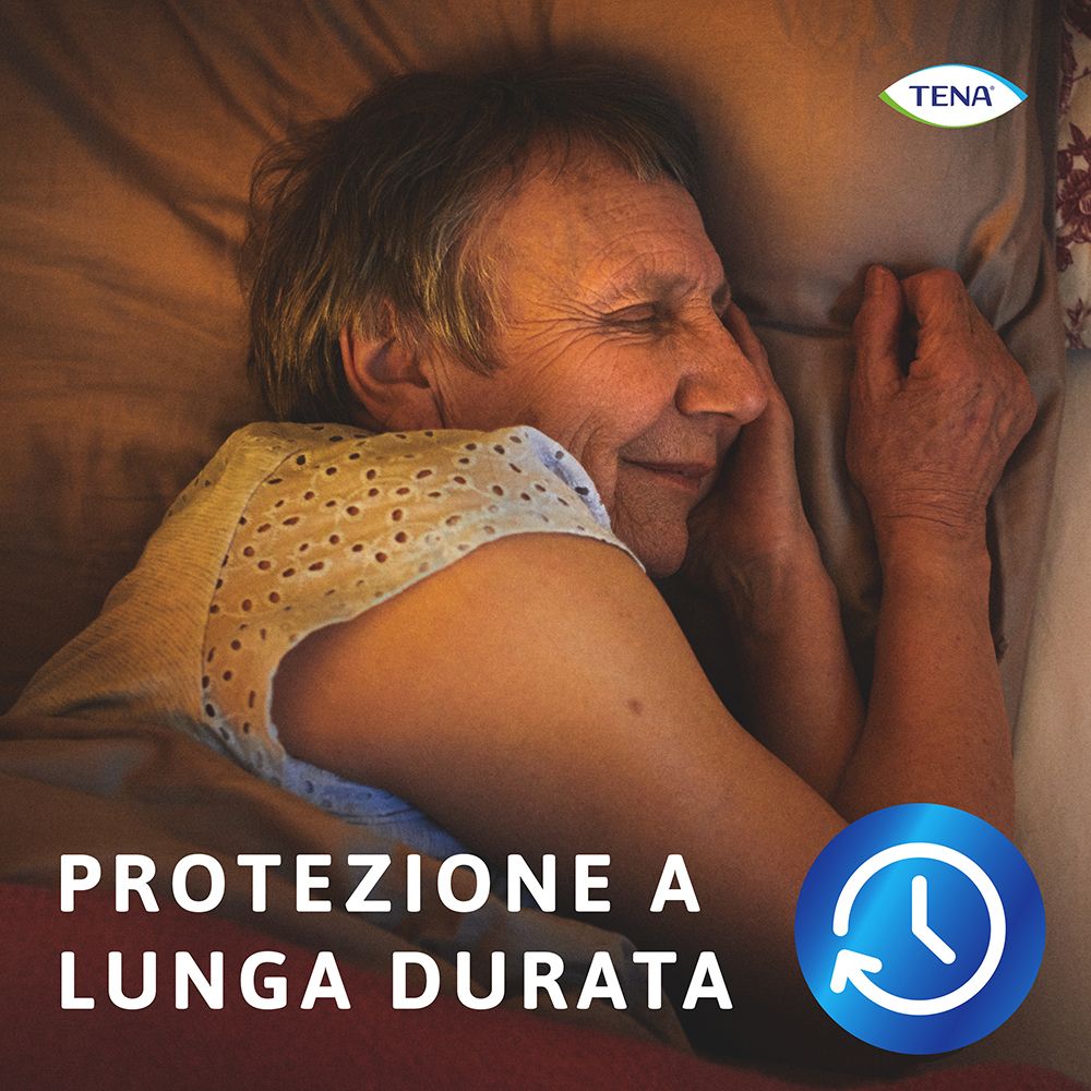 Donna anziana a letto. Logo TENA. Testo: Protezione a lunga durata (Protezione di lunga durata).