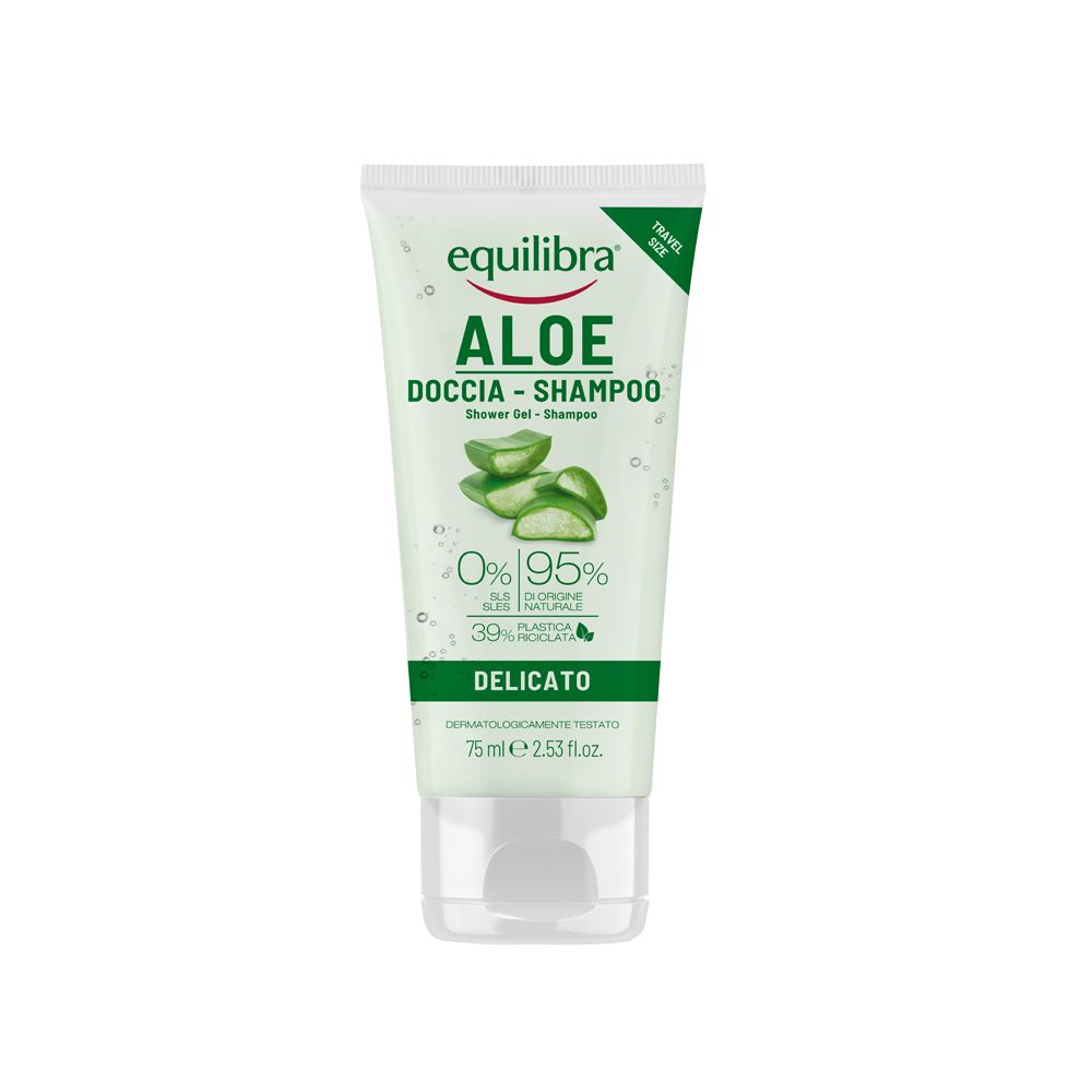 Tubo bianco di doccia-shampoo. Scritta: Equilibra Aloe Doccia-Shampoo. Contiene Aloe Vera. Dermatologicamente testato.