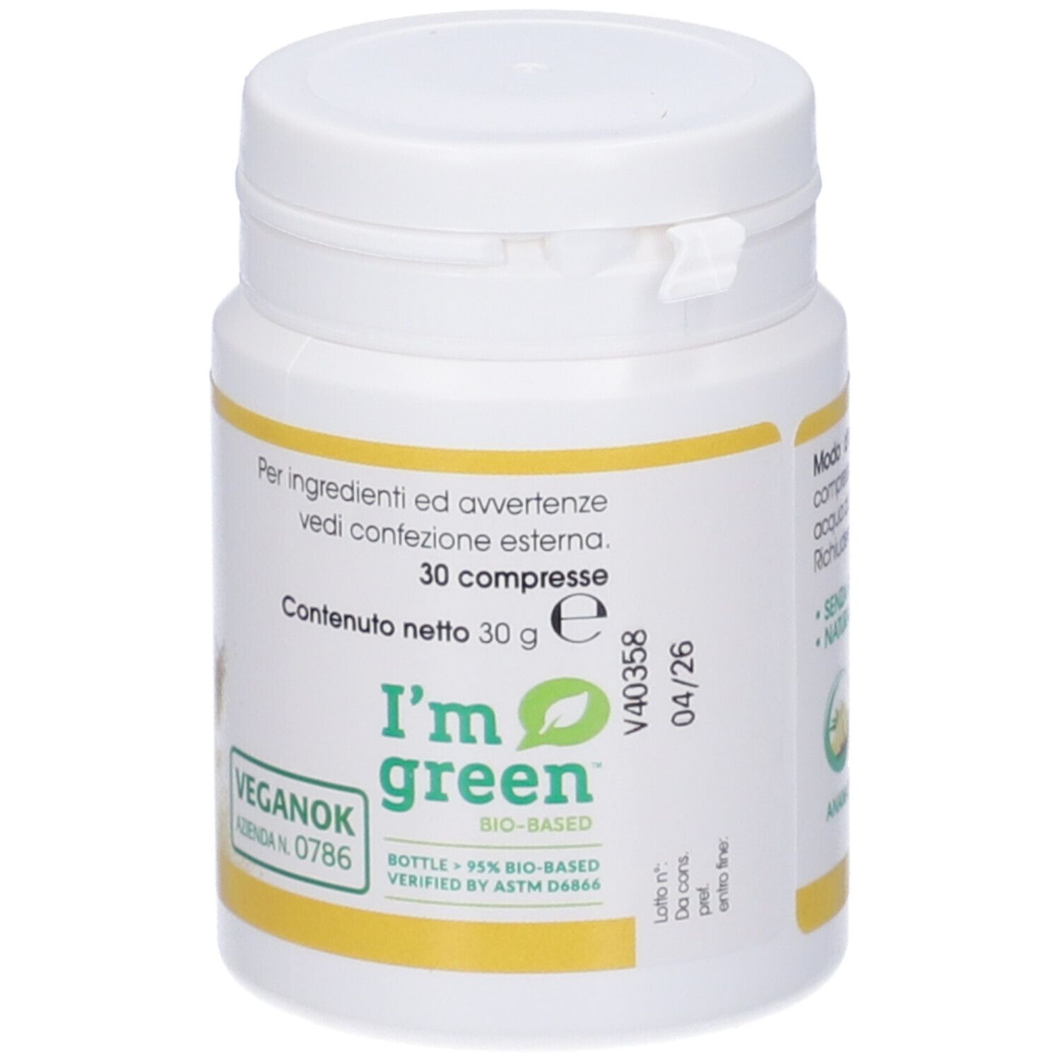 Flacone bianco con etichetta gialla. Scritta: I'm green, Veganok. Contiene 30 compresse. Bio-based.