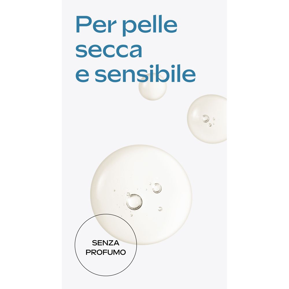Primo piano di gocce di liquido. Testo: Per pelle secca e sensibile. Senza profumo.