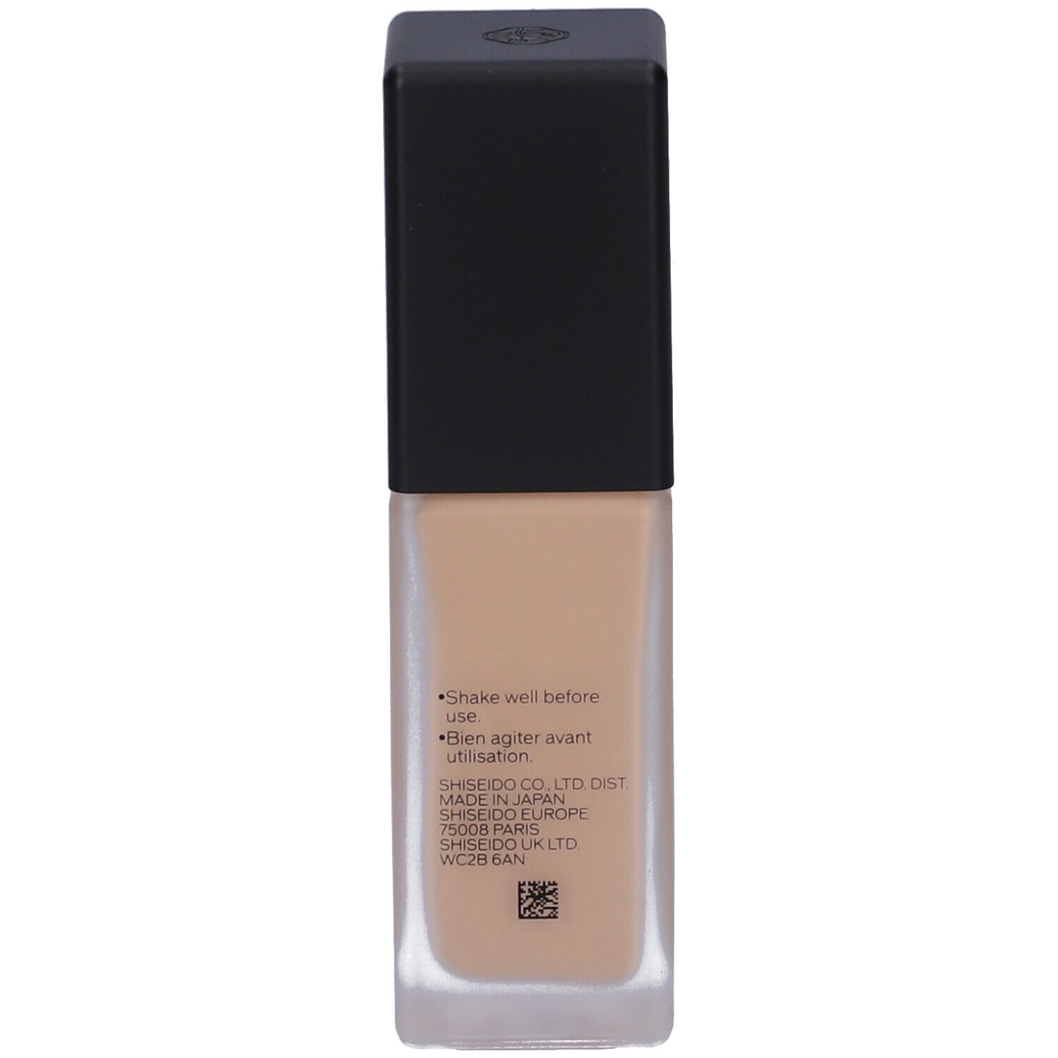 Retro del flacone di fondotinta Shiseido. Testo con istruzioni. Indirizzo del produttore e codice QR.