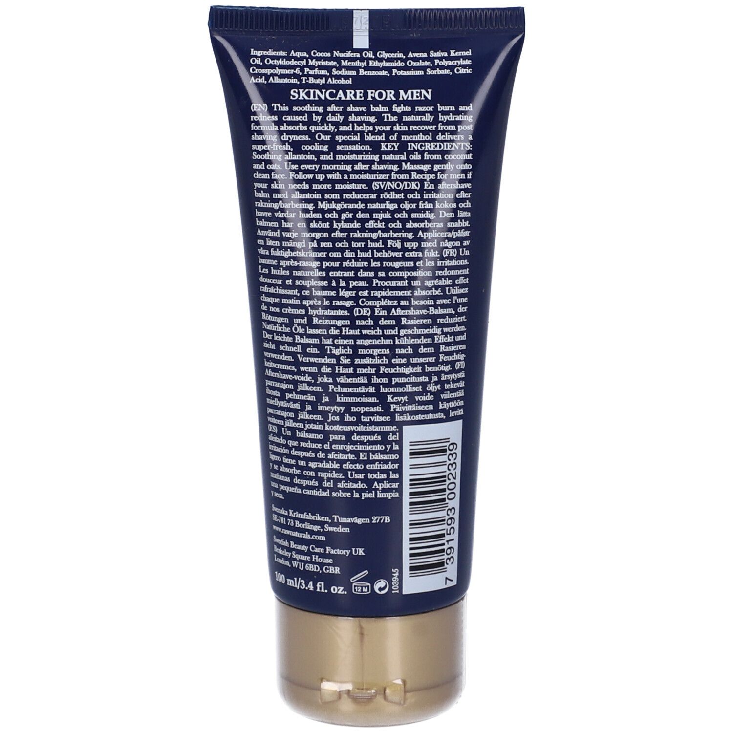 Retro del tubo. Sfondo blu scuro, tappo dorato. Testo in più lingue.