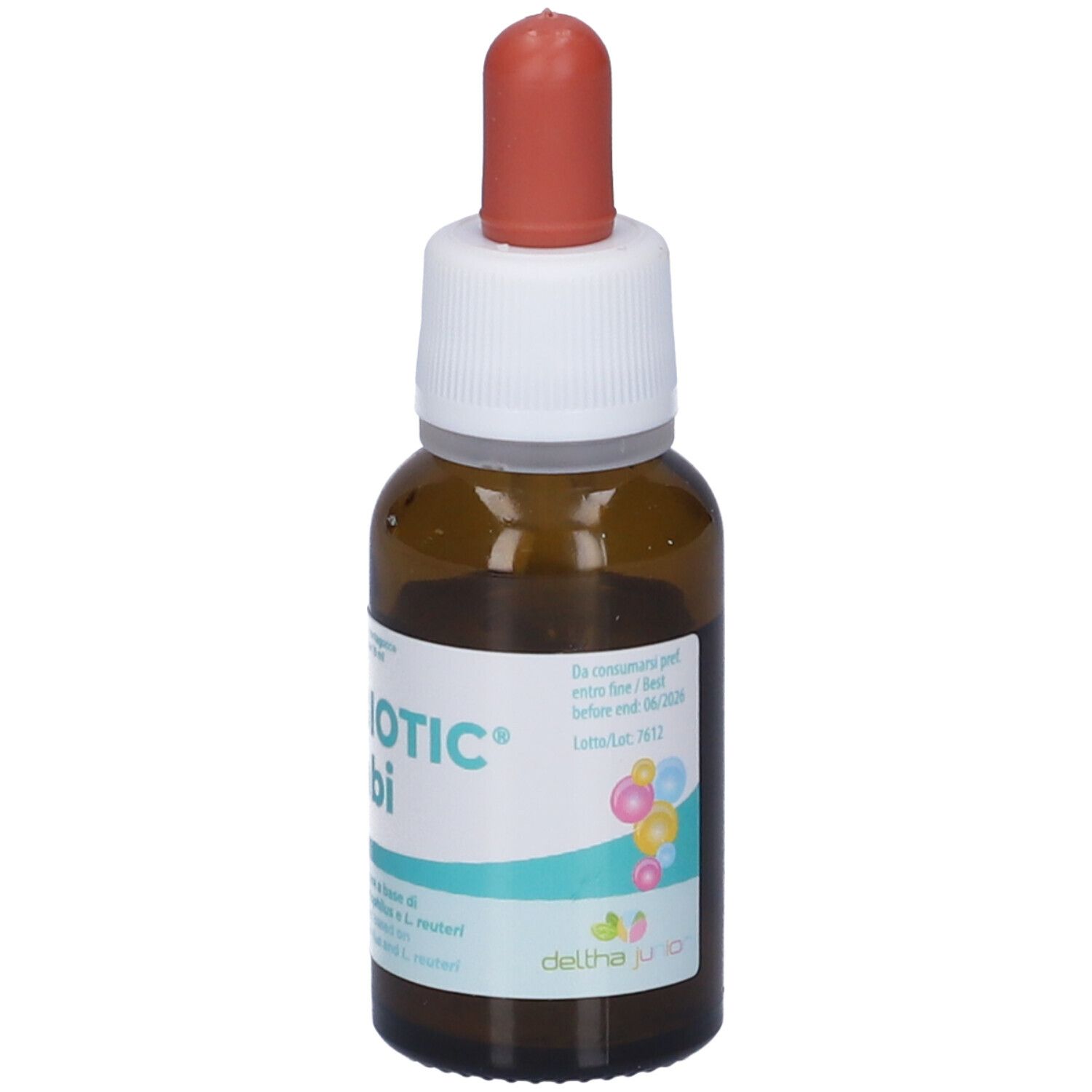 Flacone di vetro marrone con tappo bianco e punta rossa. Etichetta con nome del prodotto e grafica colorata.