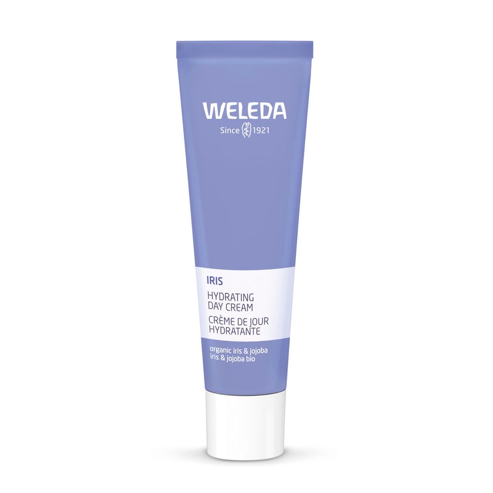 Tubo Weleda Iris Crema Giorno Idratante. Tubo viola con tappo bianco. Testo: Iris, Hydrating Day Cream, Crème de Jour Hydratante.