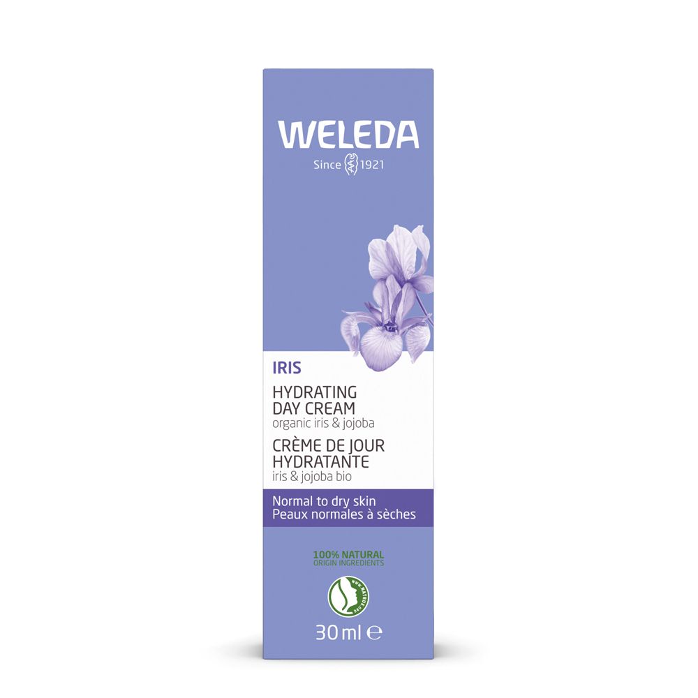 Confezione Weleda Iris Crema Giorno Idratante. Scatola viola con fiori di iris. Testo: Iris, Hydrating Day Cream, Crème de Jour Hydratante, 30 ml.