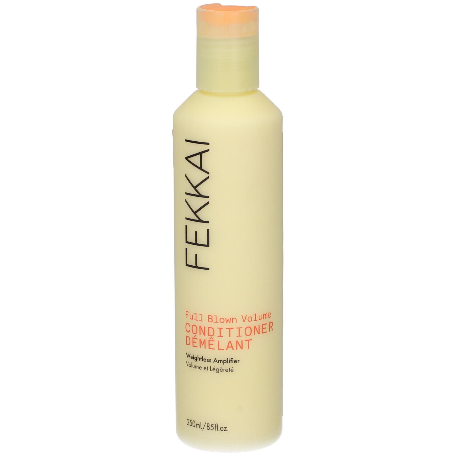 Fekkai Full Blown Balsamo Volumizzante. Bottiglia gialla con tappo a ribalta. Nome del prodotto e marchio stampati.