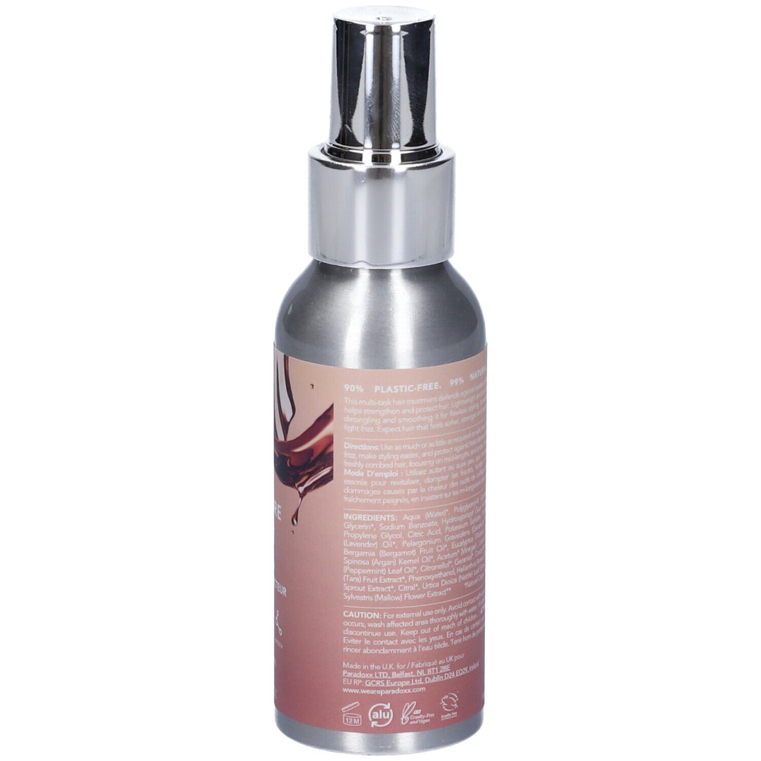 Retro del flacone spray. Testo con ingredienti e avvertenze. Sigillo vegano.