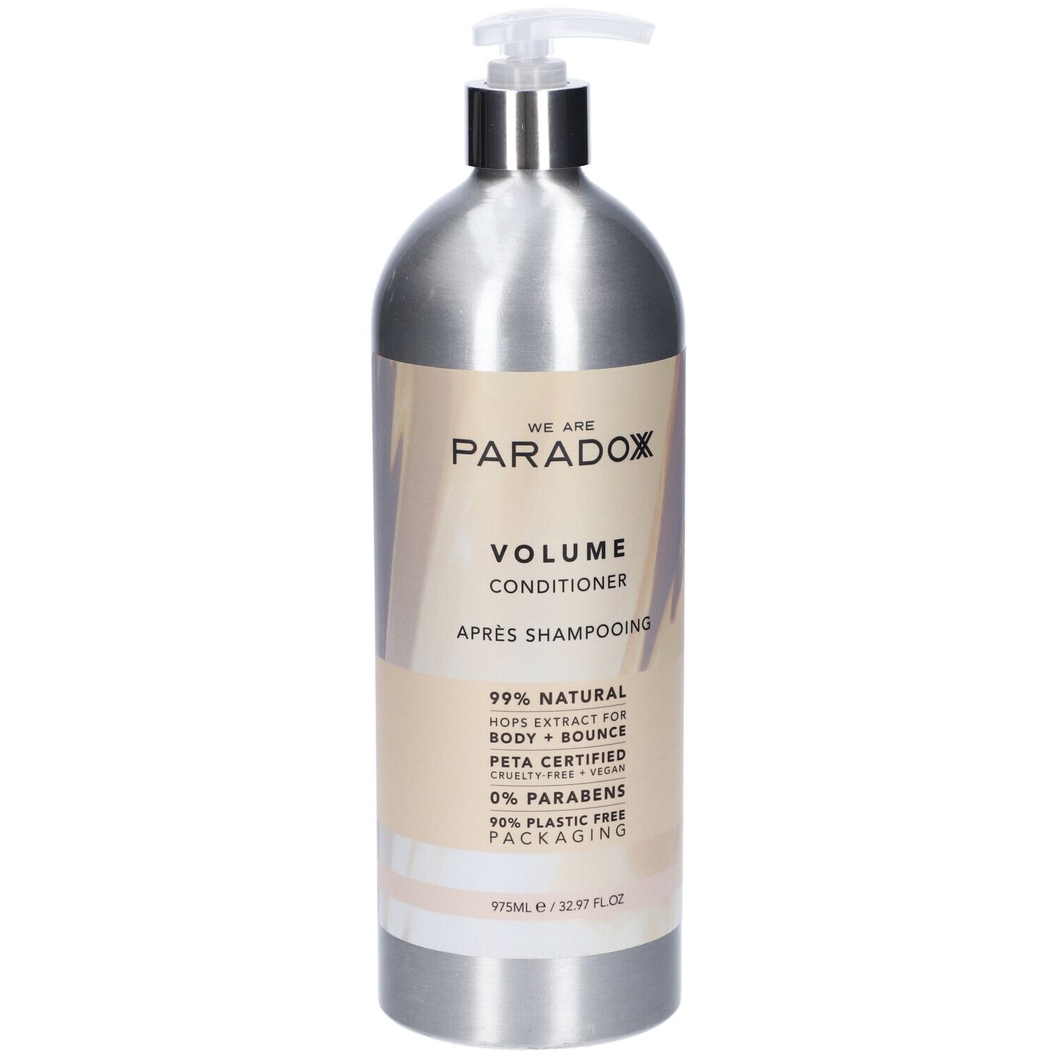 Flacone argento con dosatore. Scritta: We Are Paradox, Volume Conditioner. Certificazione PETA.