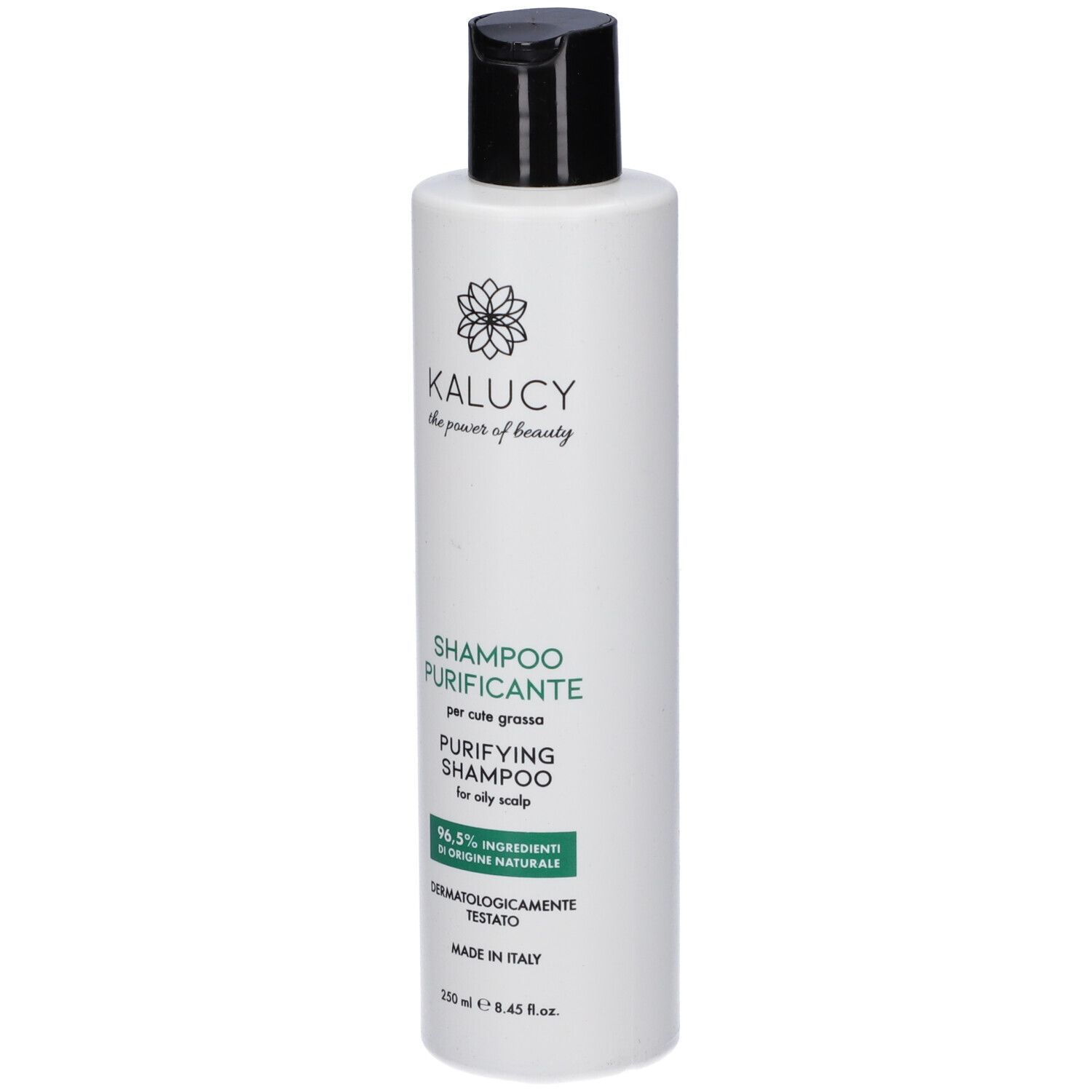 Flacone bianco con tappo nero. Scritta: KALUCY, Shampoo Purificante, per cute grassa. 96,5% ingredienti di origine naturale. Dermatologicamente testato.