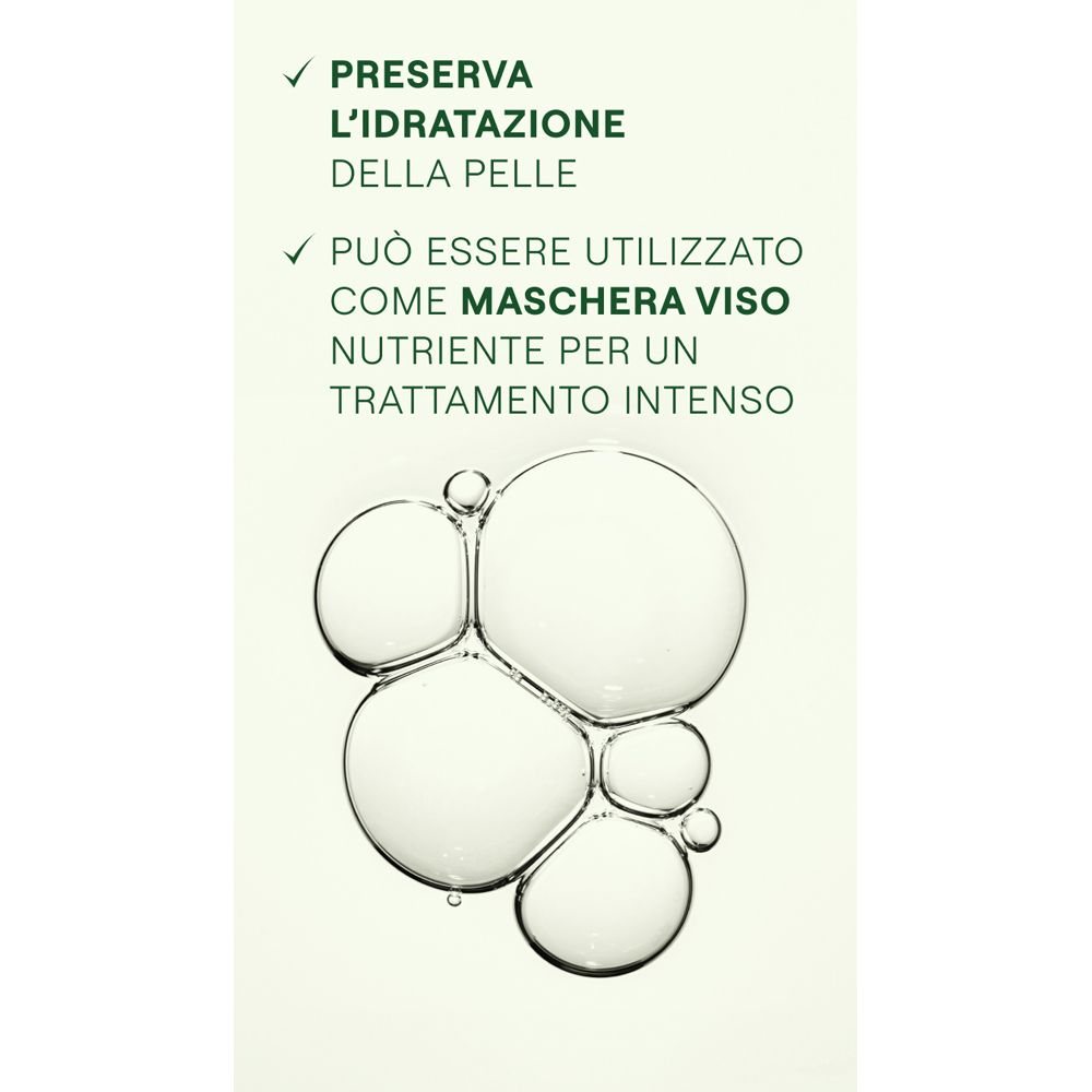 Primo piano di gocce di liquido. Testo: Preserva l'idratazione della pelle. Può essere usato come maschera nutriente.